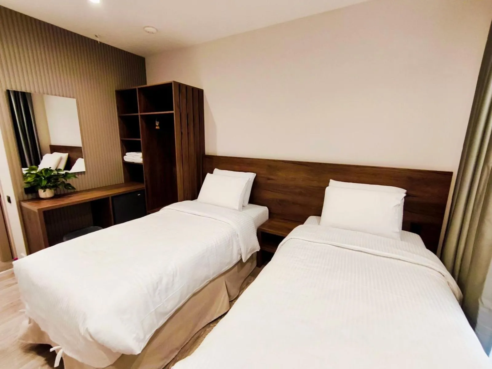 Bed in D Suites & Rooms