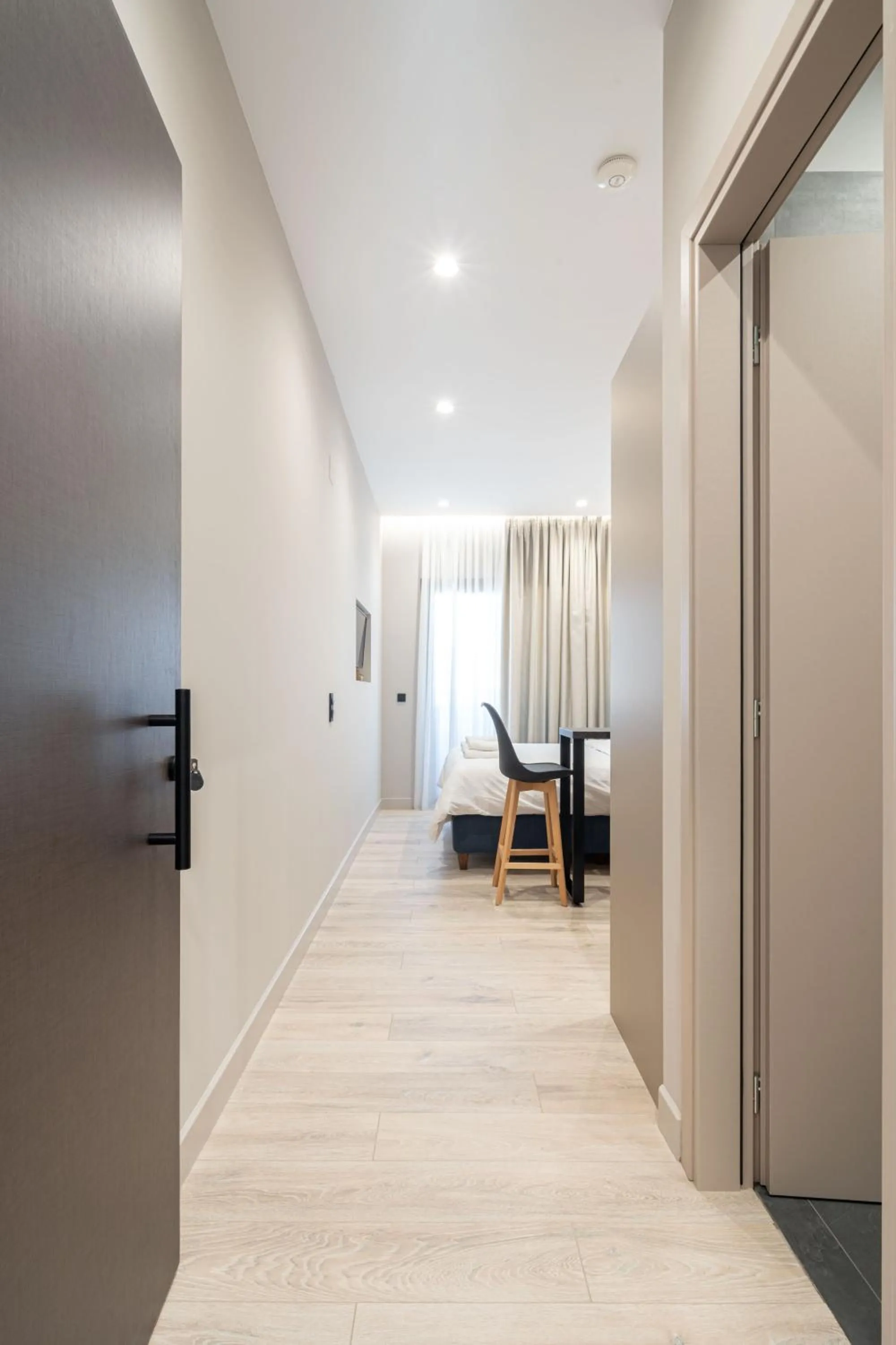 Bedroom in D Suites & Rooms