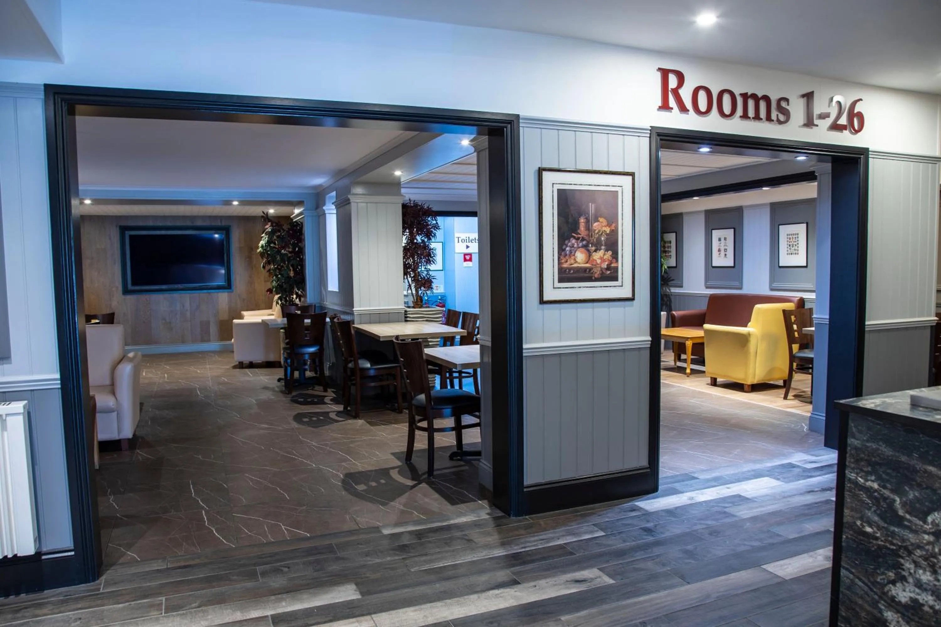 Communal lounge/ TV room in Best Western Manor Hotel