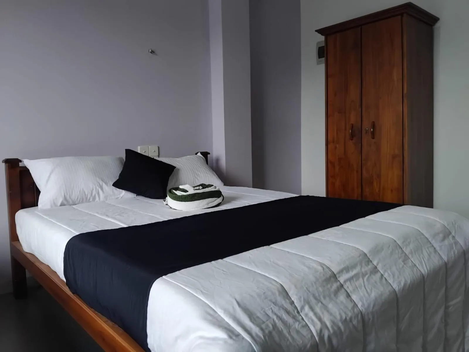 Bed in Esha Beach Resort Rooms