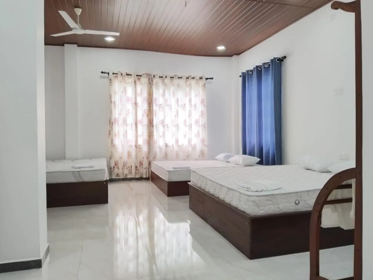 Bed in Esha Beach Resort Rooms