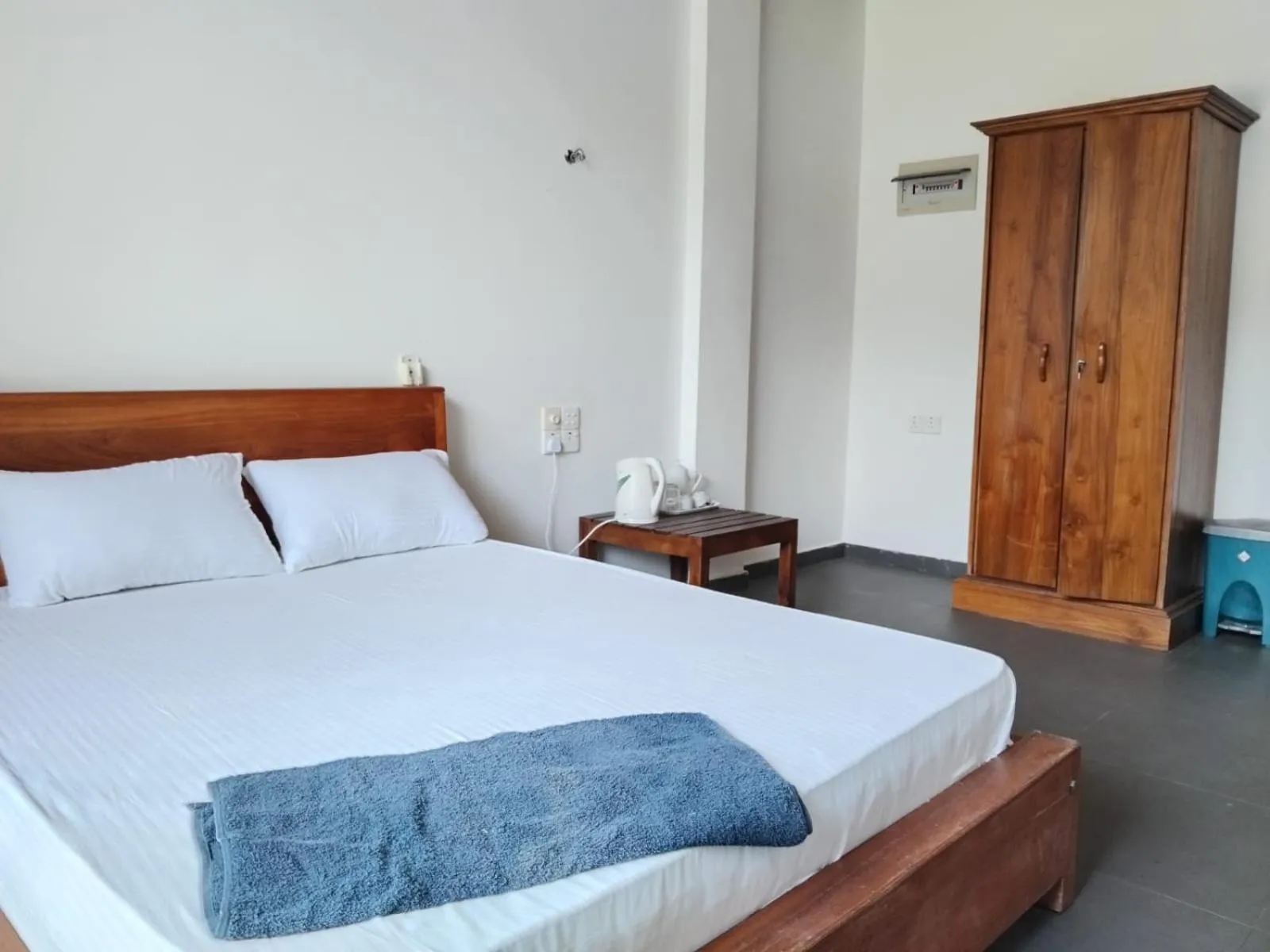 Bed in Esha Beach Resort Rooms