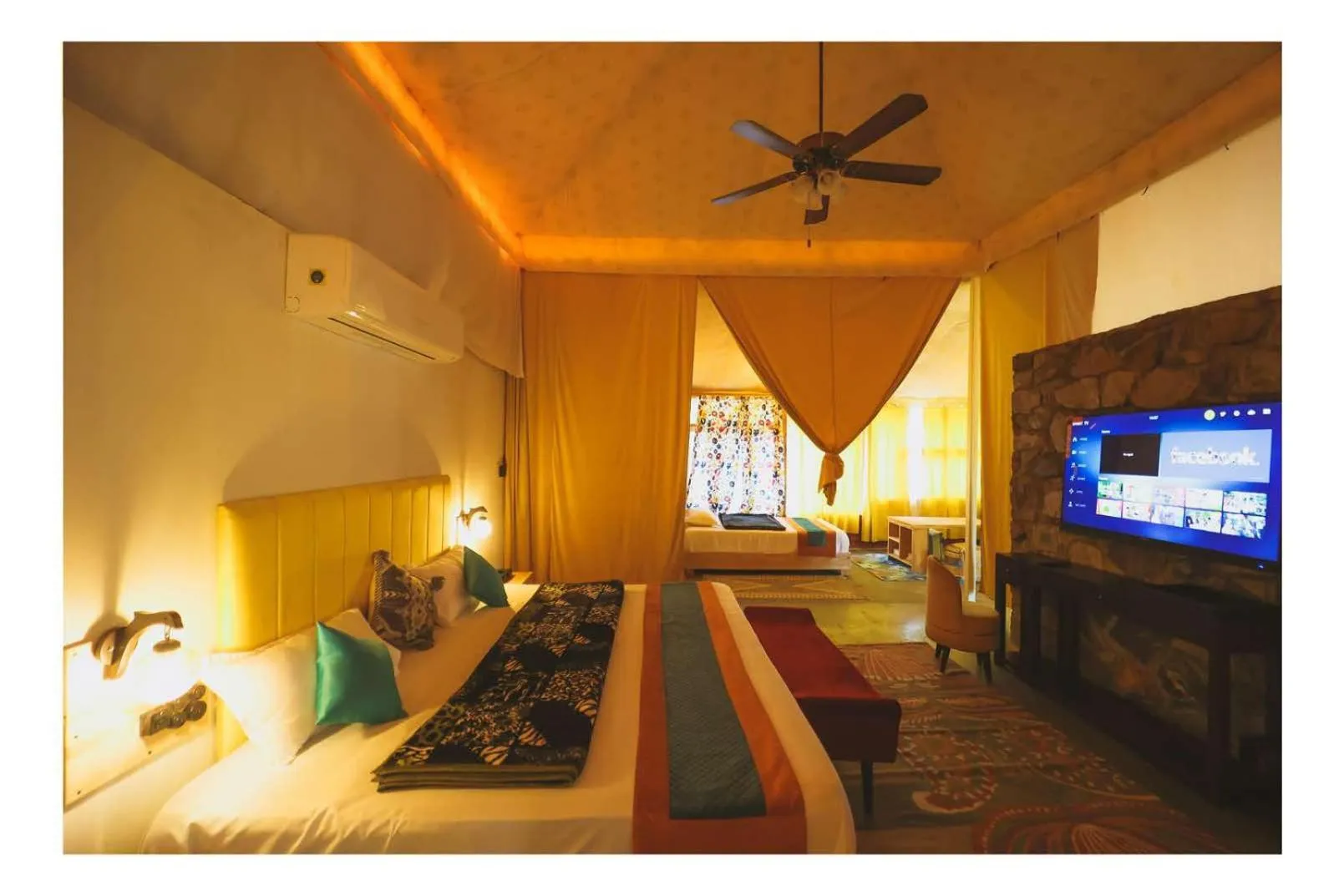 Communal lounge/ TV room, Bed in Aranya by Stories