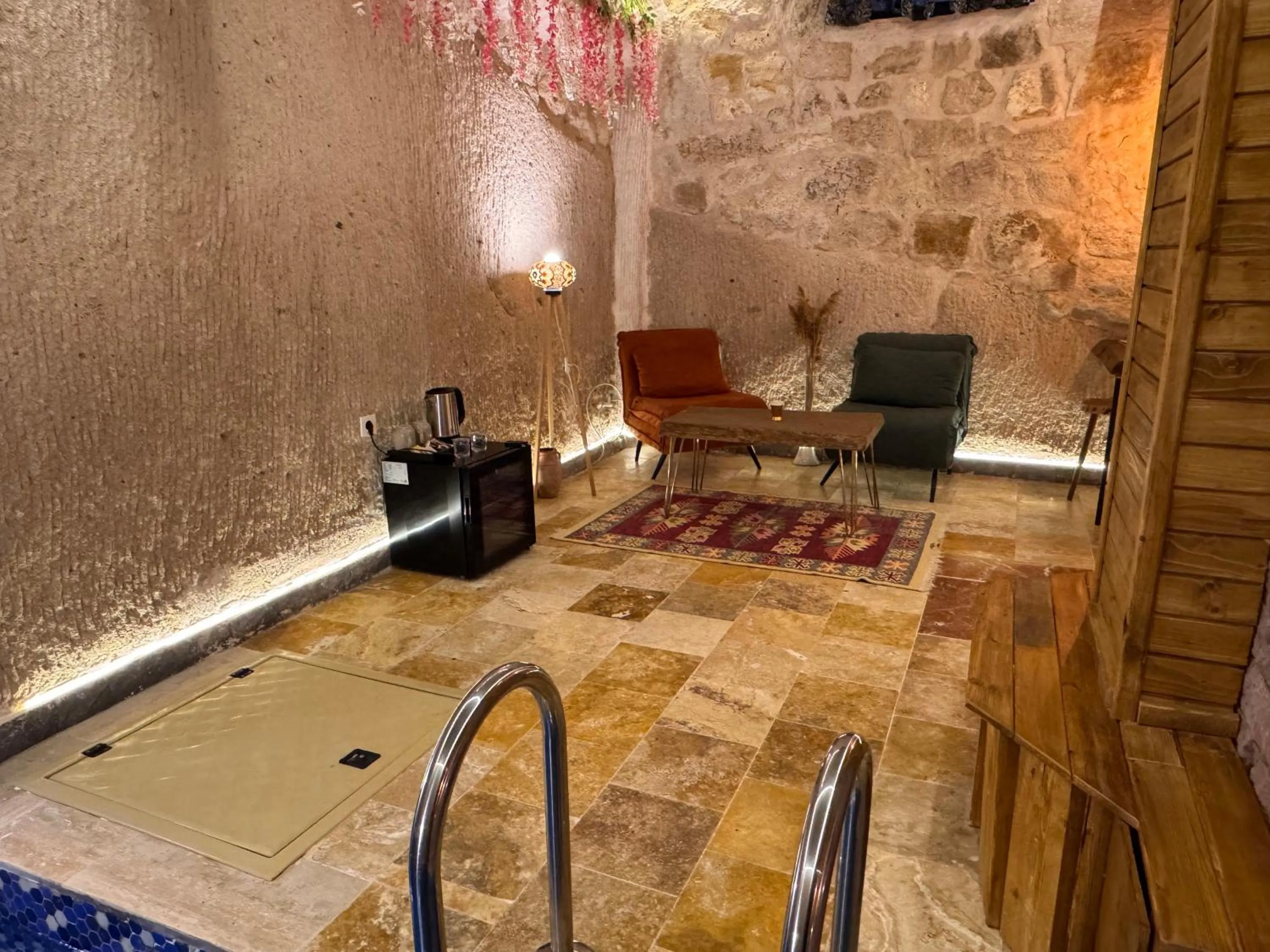 Living room in Ceran Stone House