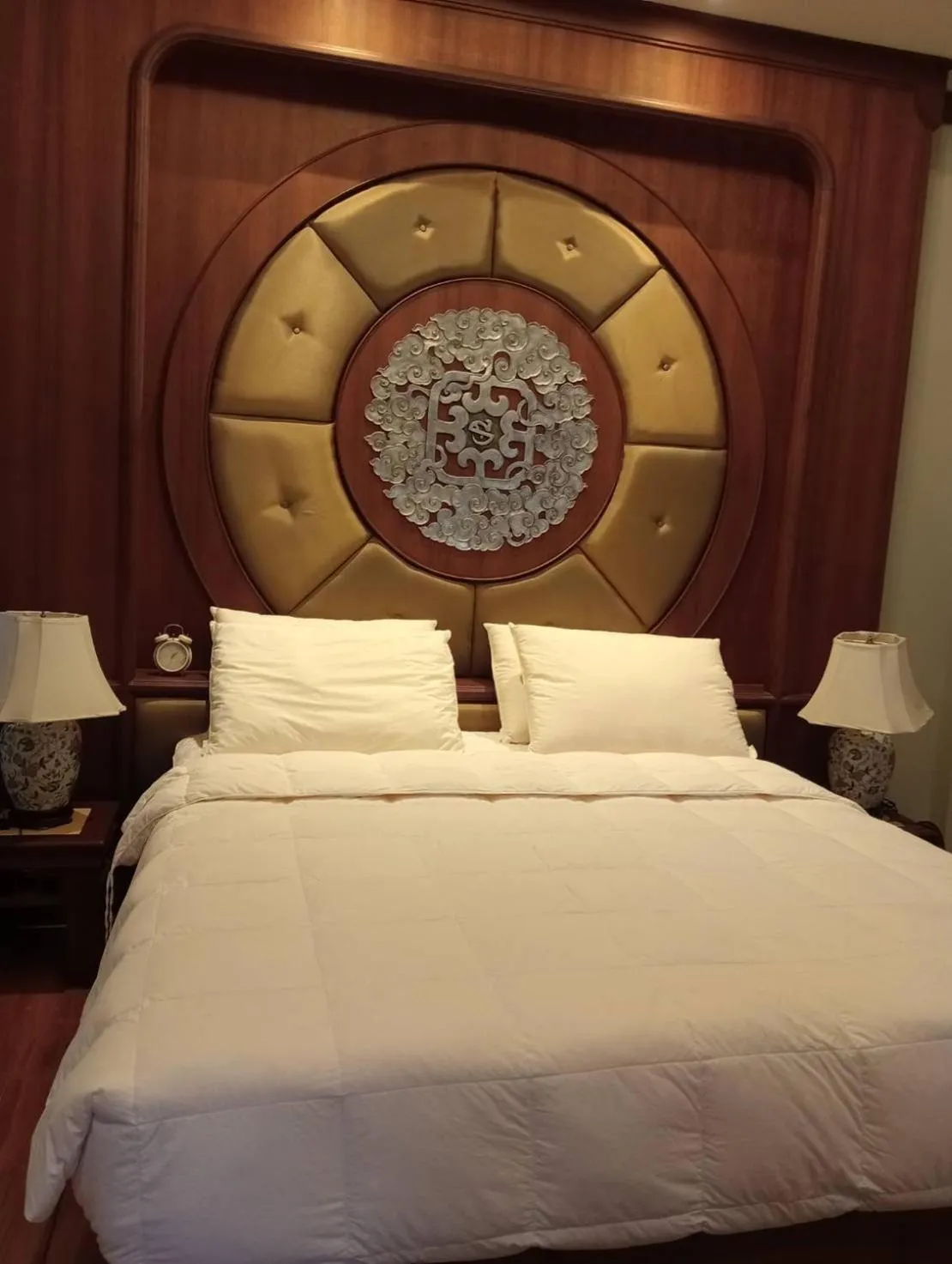 Bed in Lunar Mansion Hotel