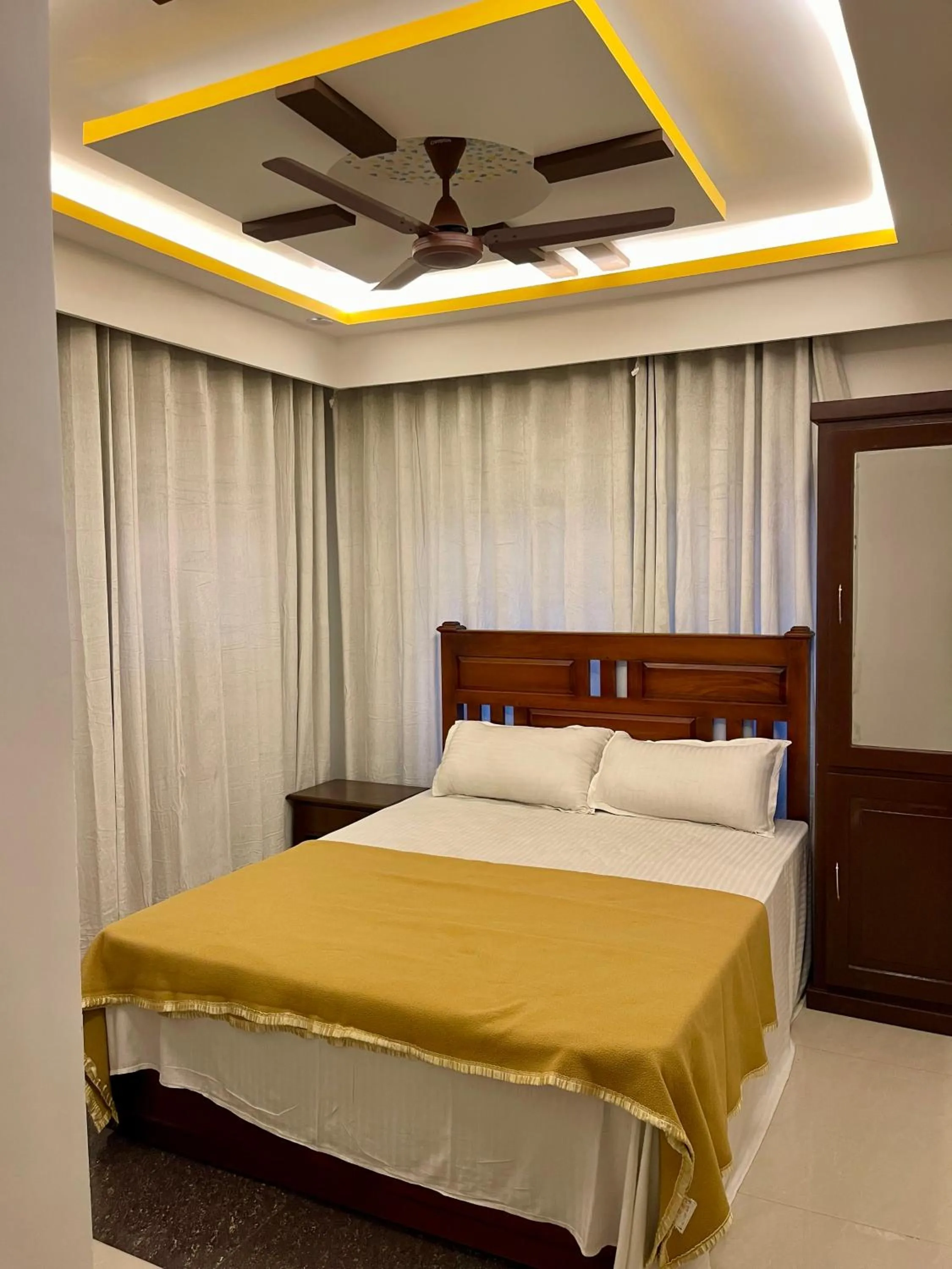 Bed in Puthookkadans Mareena Lodge