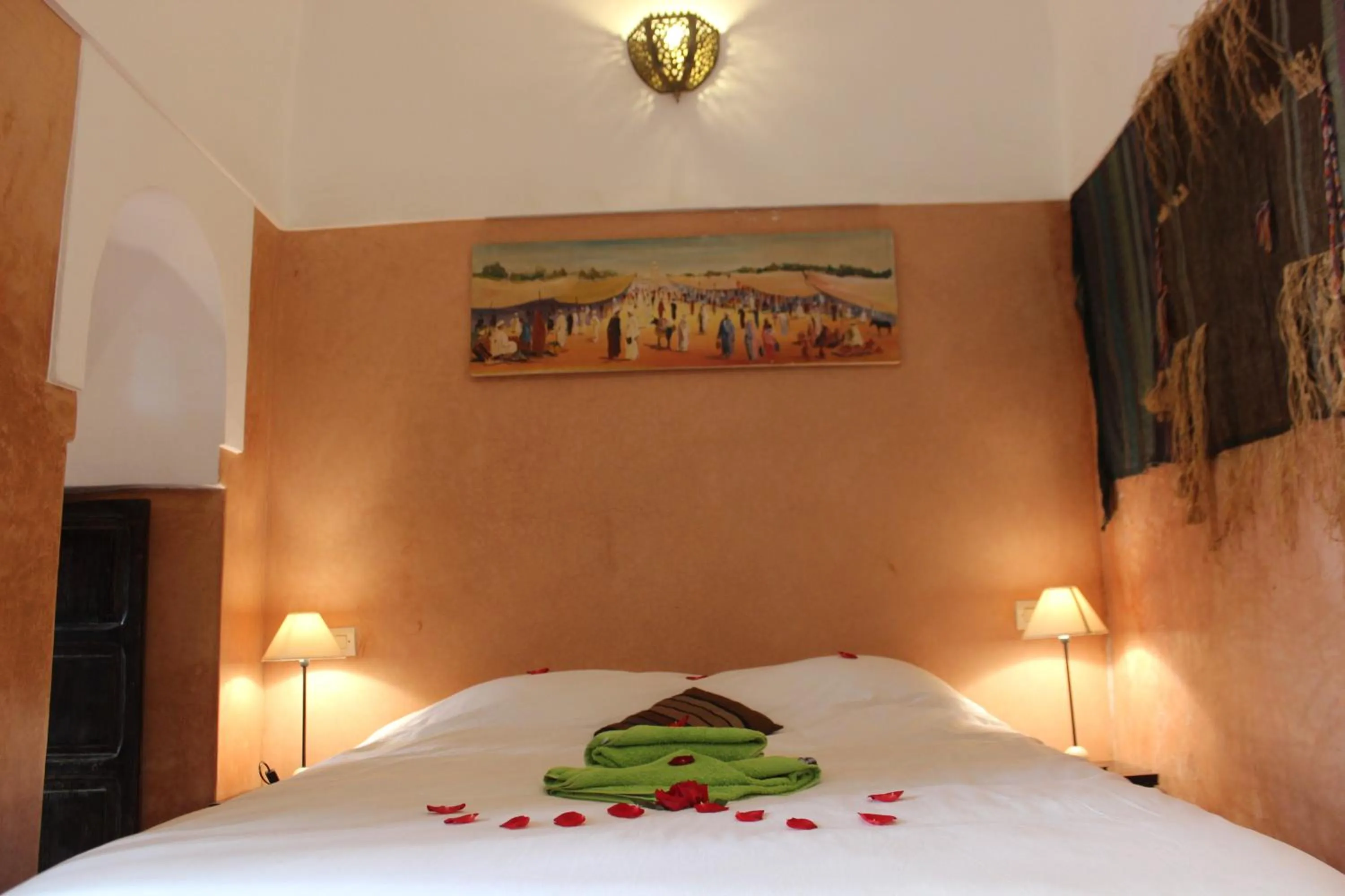 Bed in Riad Jnan El Cadi