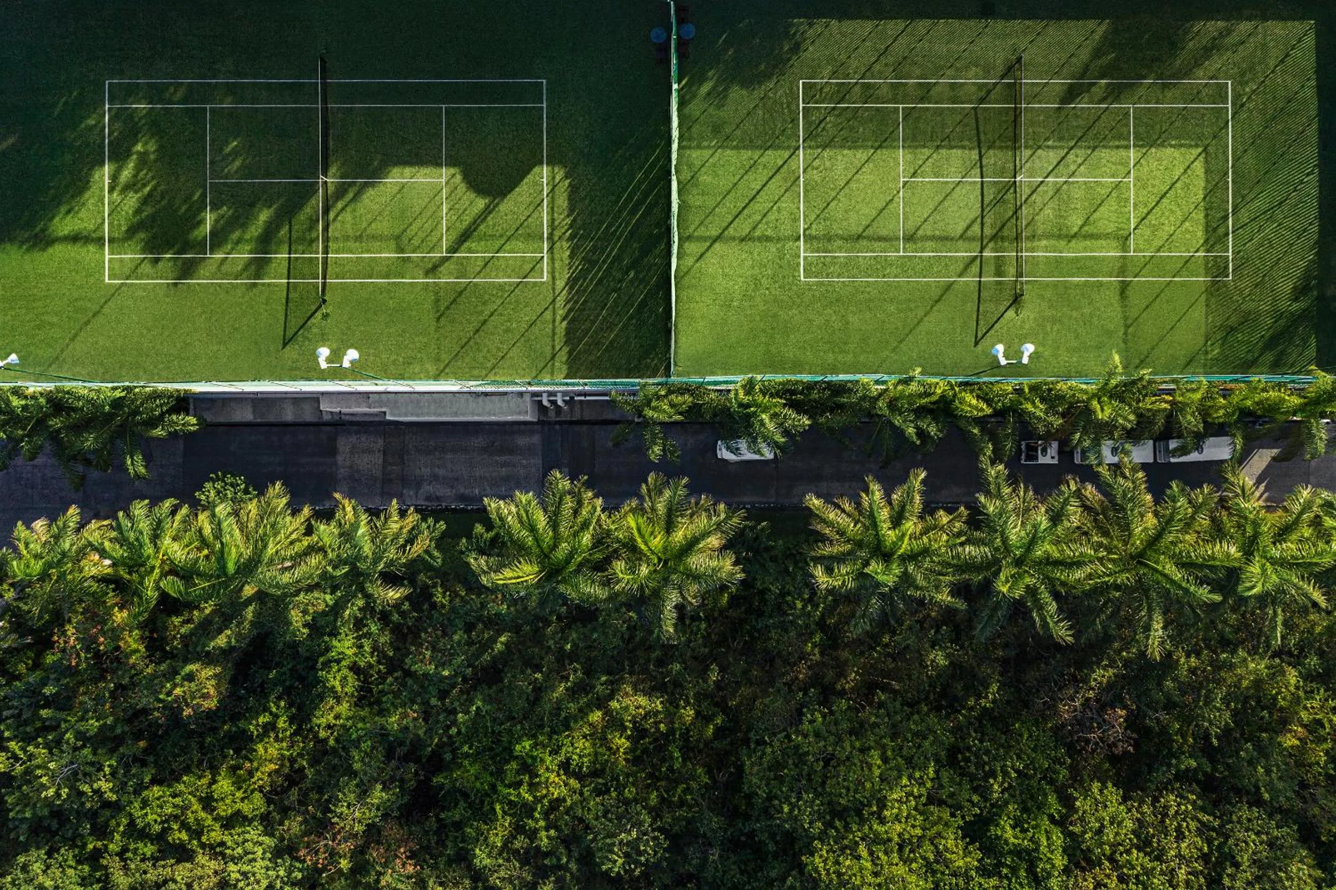 Tennis court in Jungala Hotel at VidantaWorld Riviera Maya