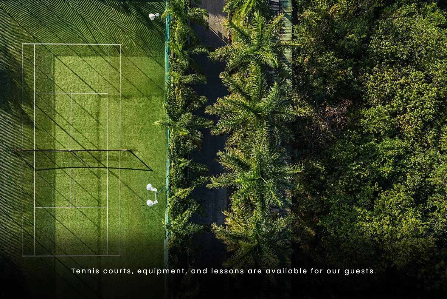 Tennis court in Jungala Hotel at VidantaWorld Riviera Maya