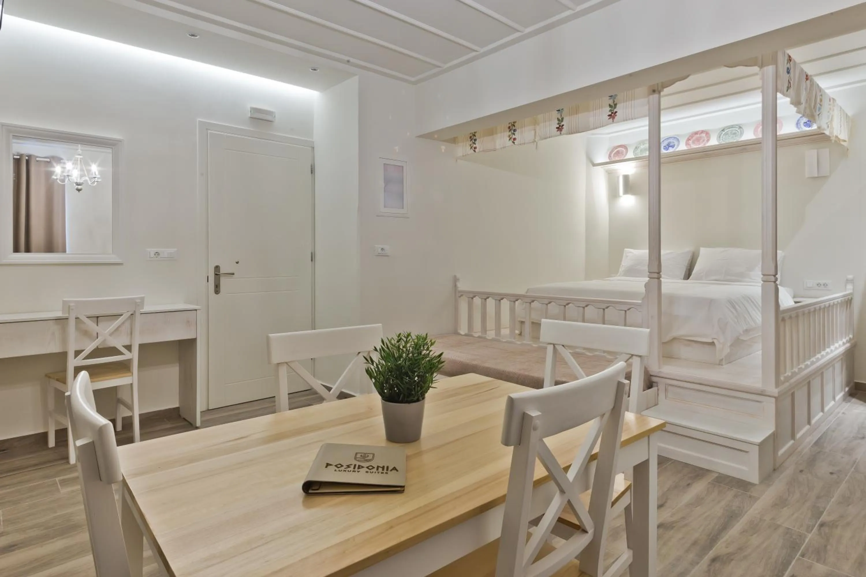 Bed in Posidonia Luxury Suites