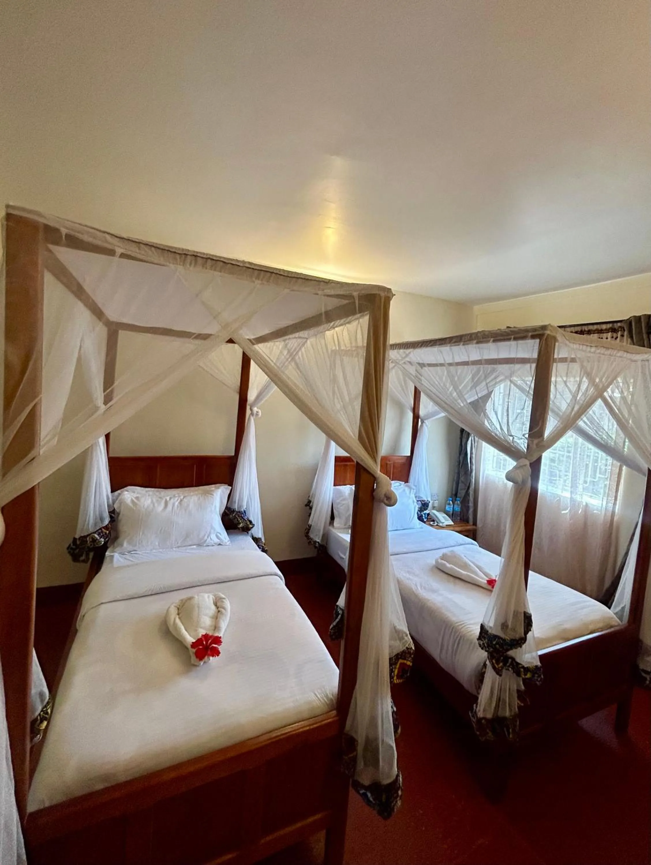 Bed in Patamu Restaurants Lodge & Safaris