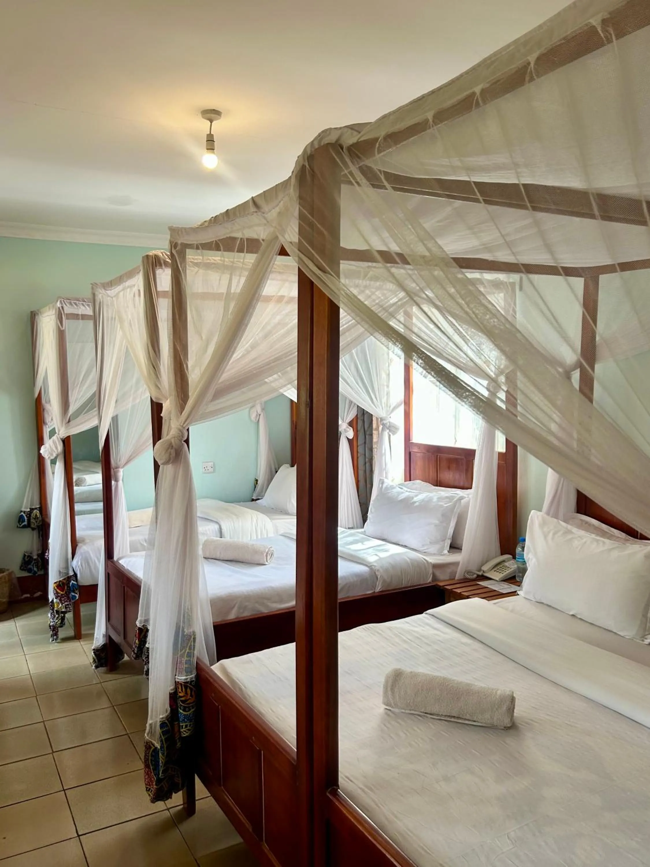 Bed in Patamu Restaurants Lodge & Safaris