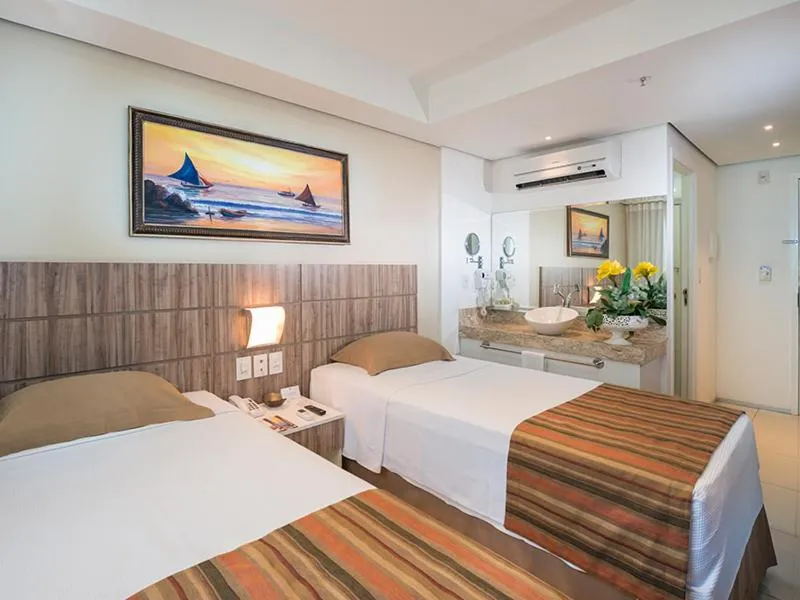 Bed in Profissionalle Hotel São Luís