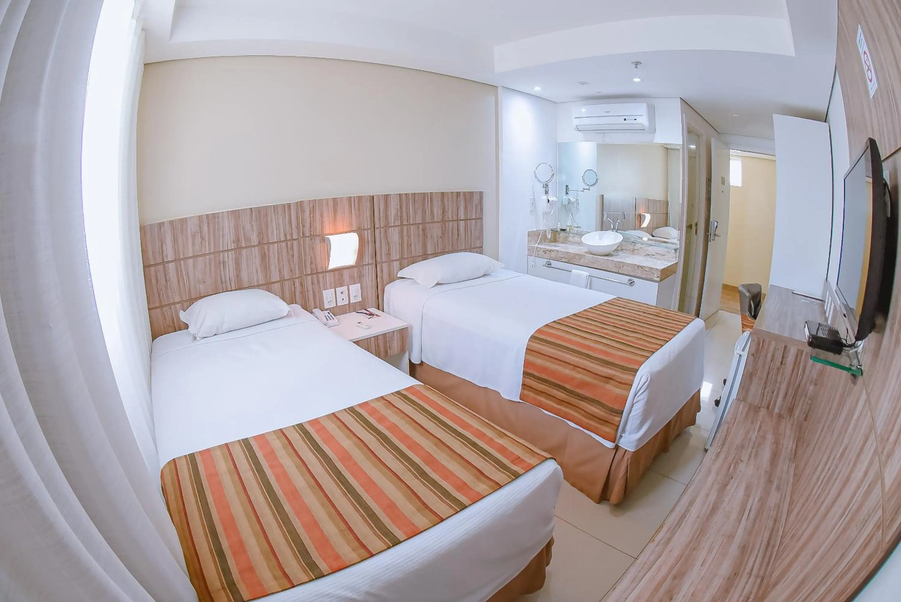 Bed in Profissionalle Hotel São Luís