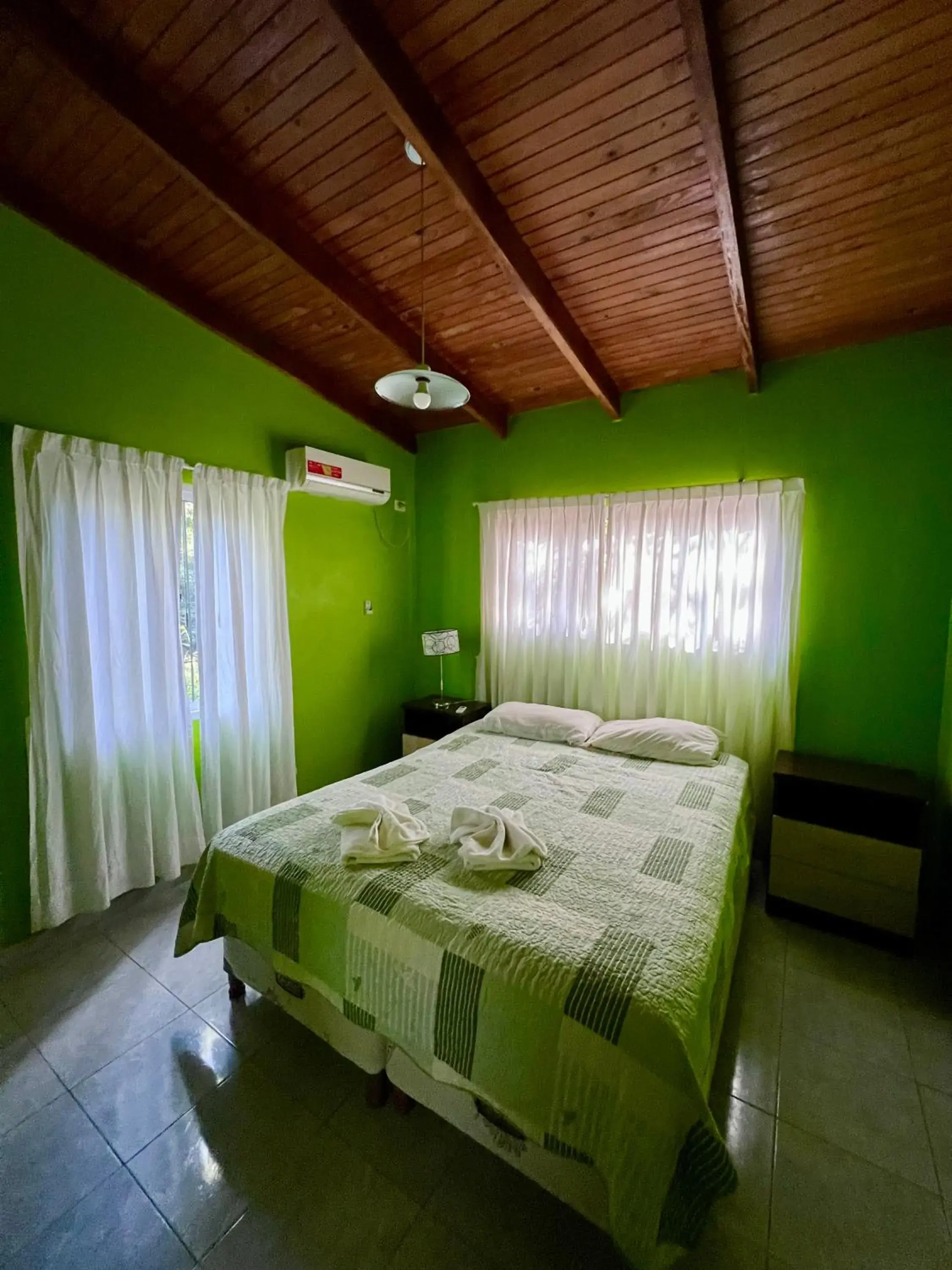 Bed in Rainforest Hotel & Cabañas Bed in Rainforest Hotel & Cabañas