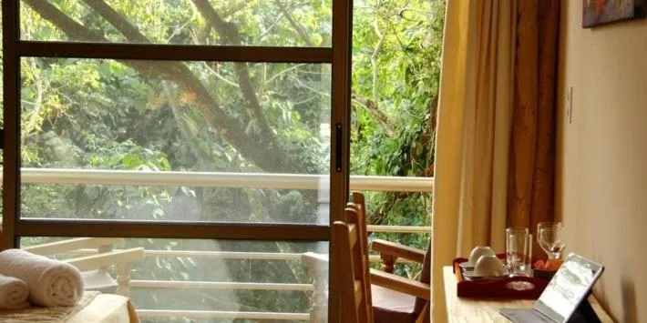Bedroom in Rainforest Hotel & Cabañas