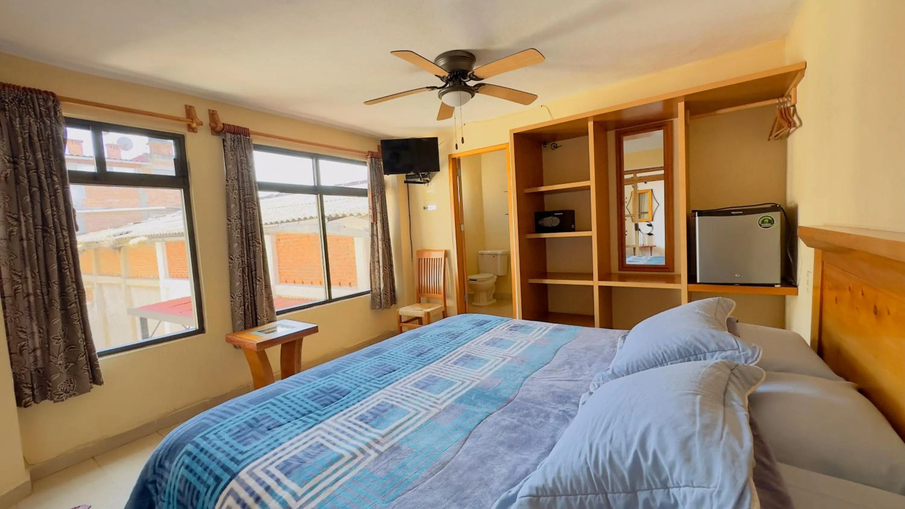 Communal lounge/ TV room, Bed in Posada El Campanario