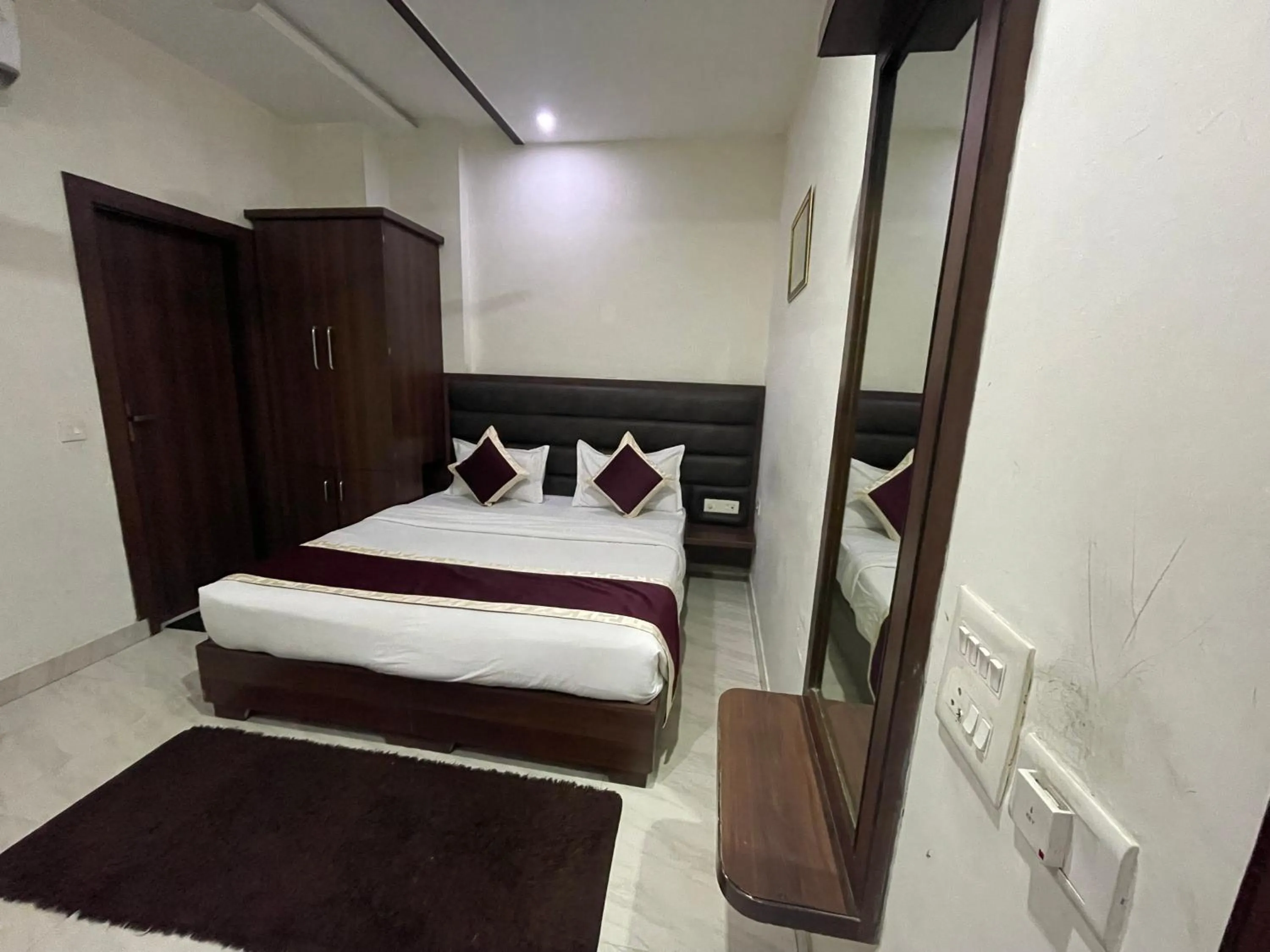 Bed in Hotel Opal Courtyard