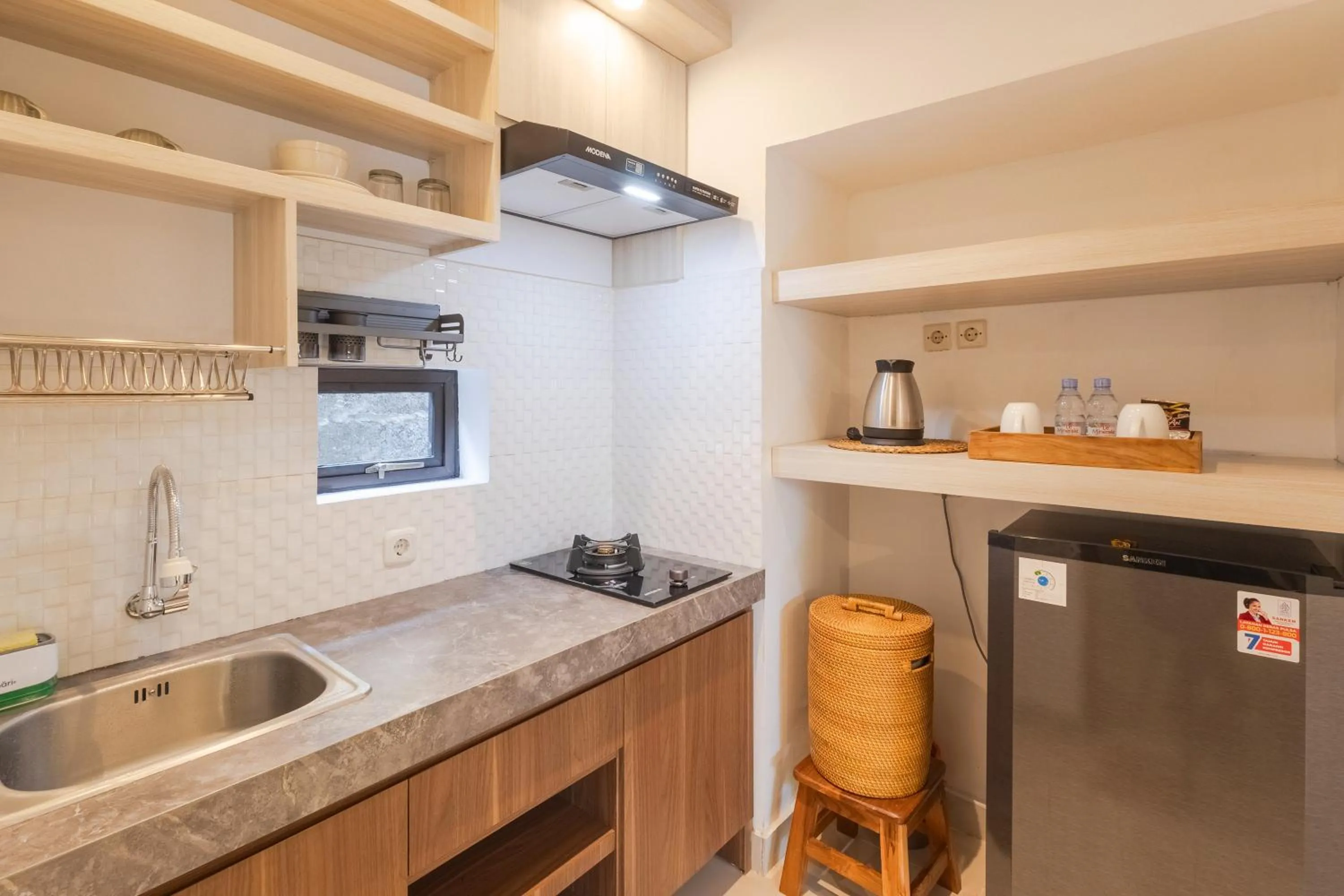 Kitchen or kitchenette in Wayan Homestay Sanur