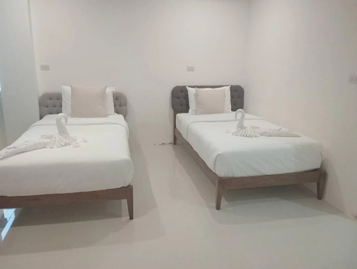 Bed in ZAYN Samui Hotel