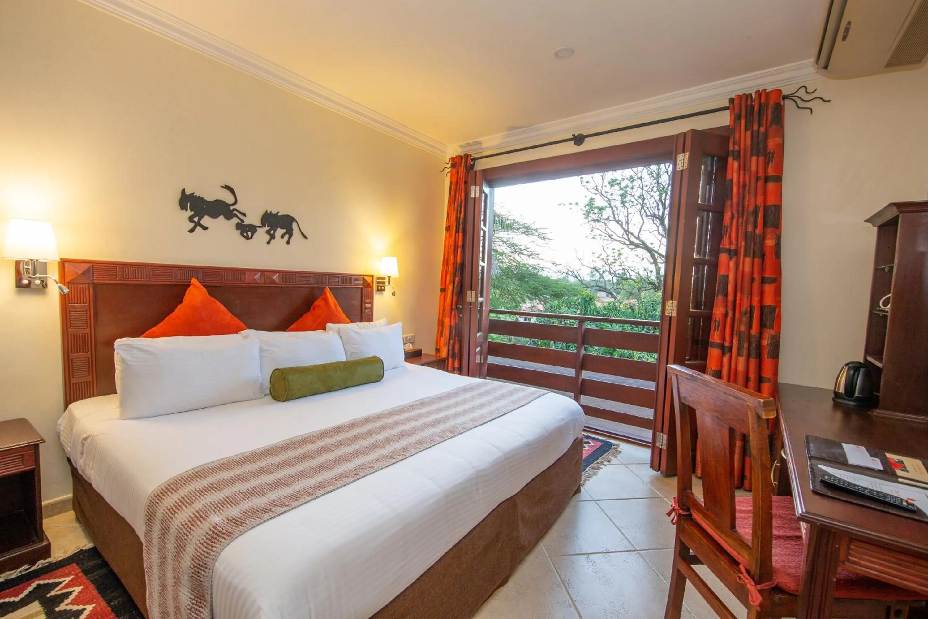 View (from property/room), Bed in African Tulip Hotel