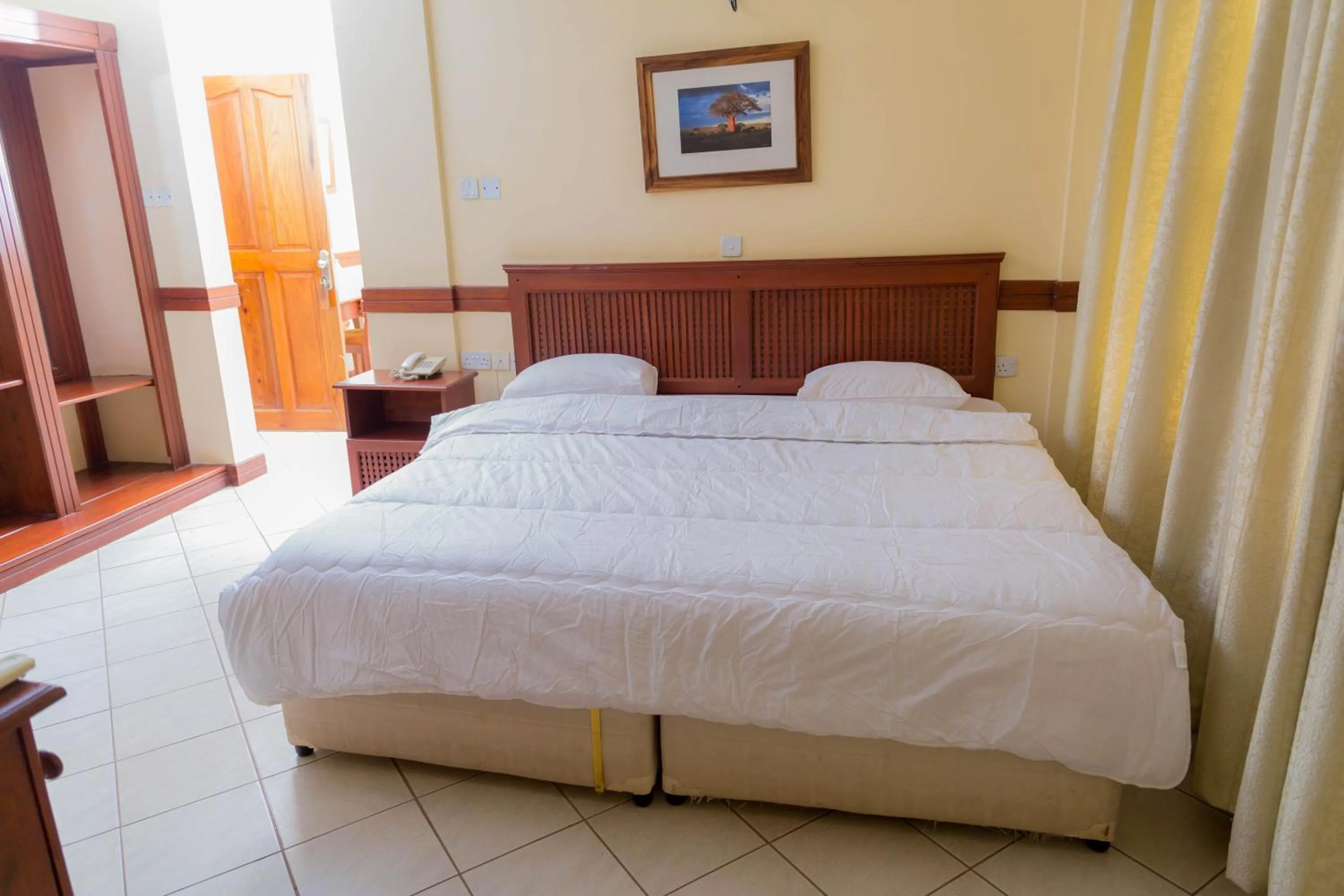 Bedroom in Moshi Leopard Hotel