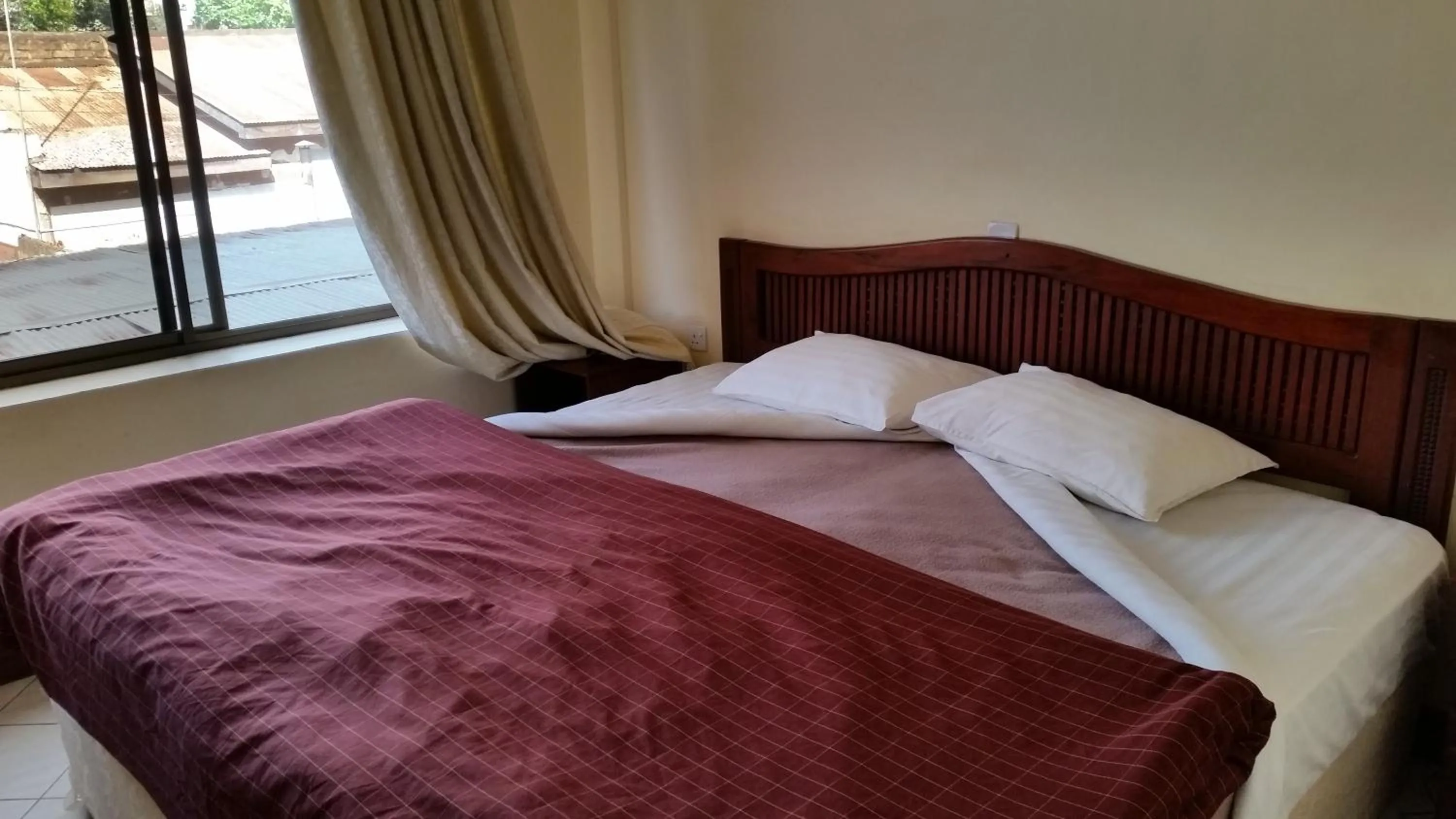 Bedroom in Moshi Leopard Hotel