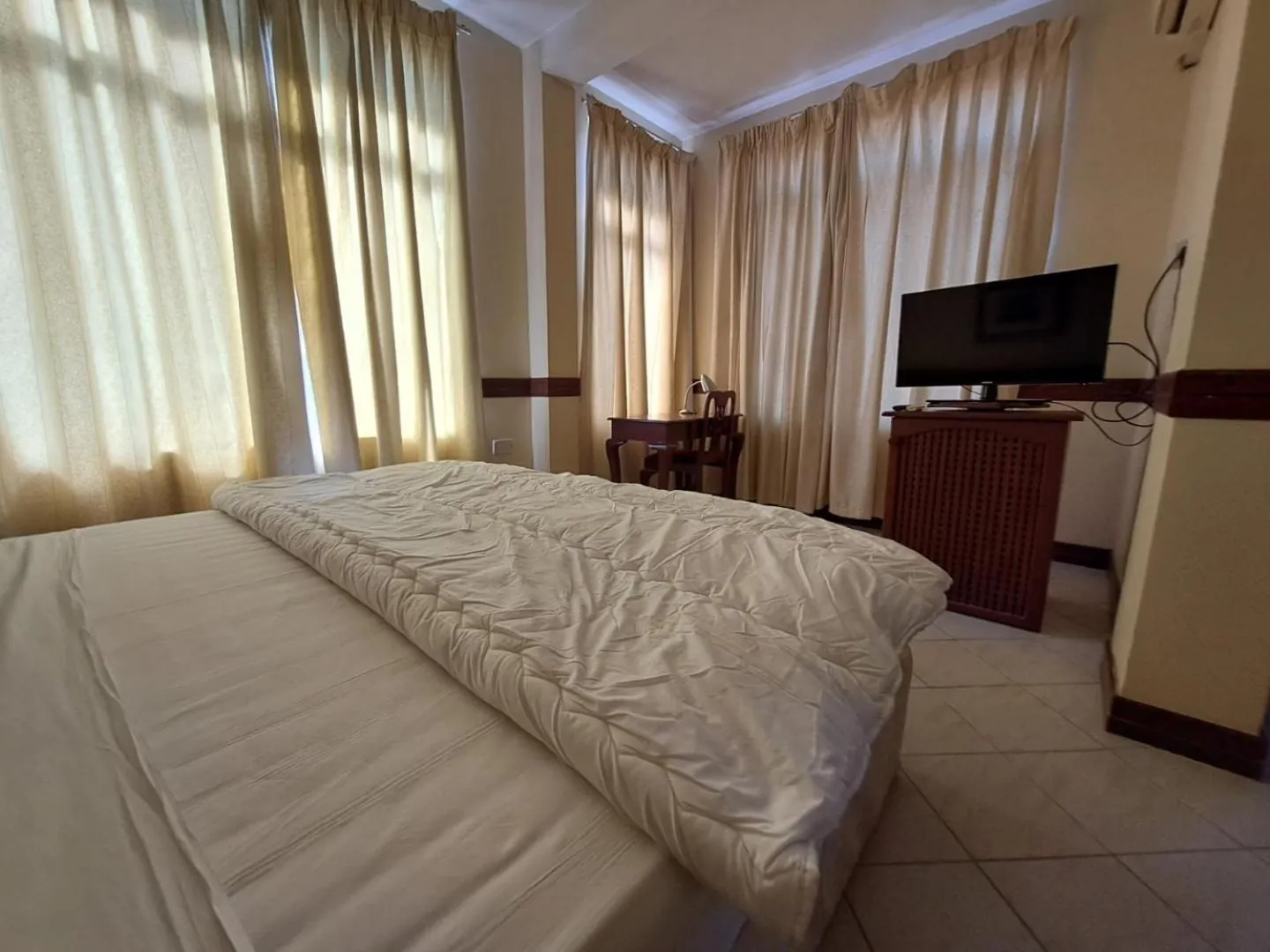 Bed in Moshi Leopard Hotel