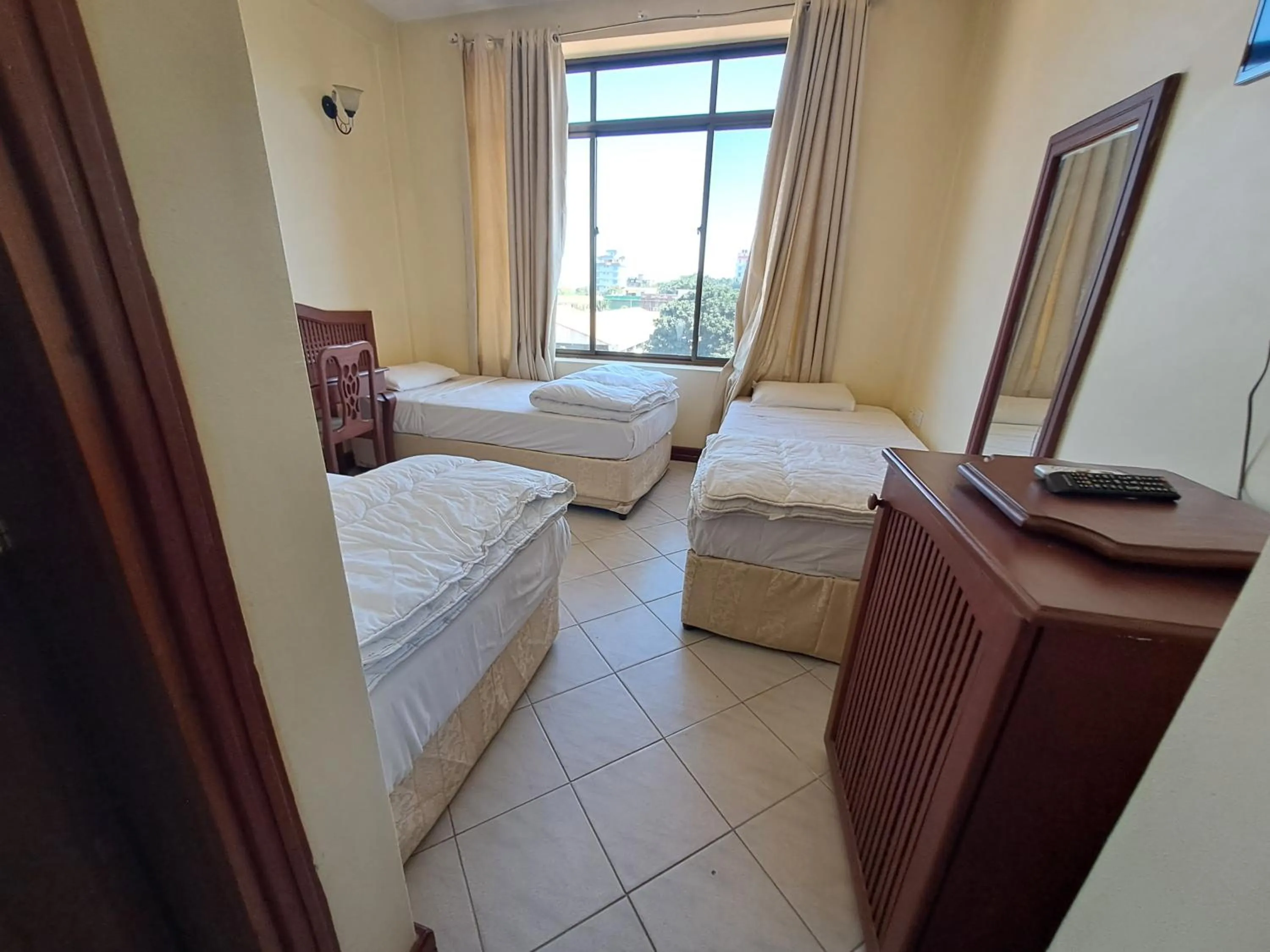 Bed in Moshi Leopard Hotel