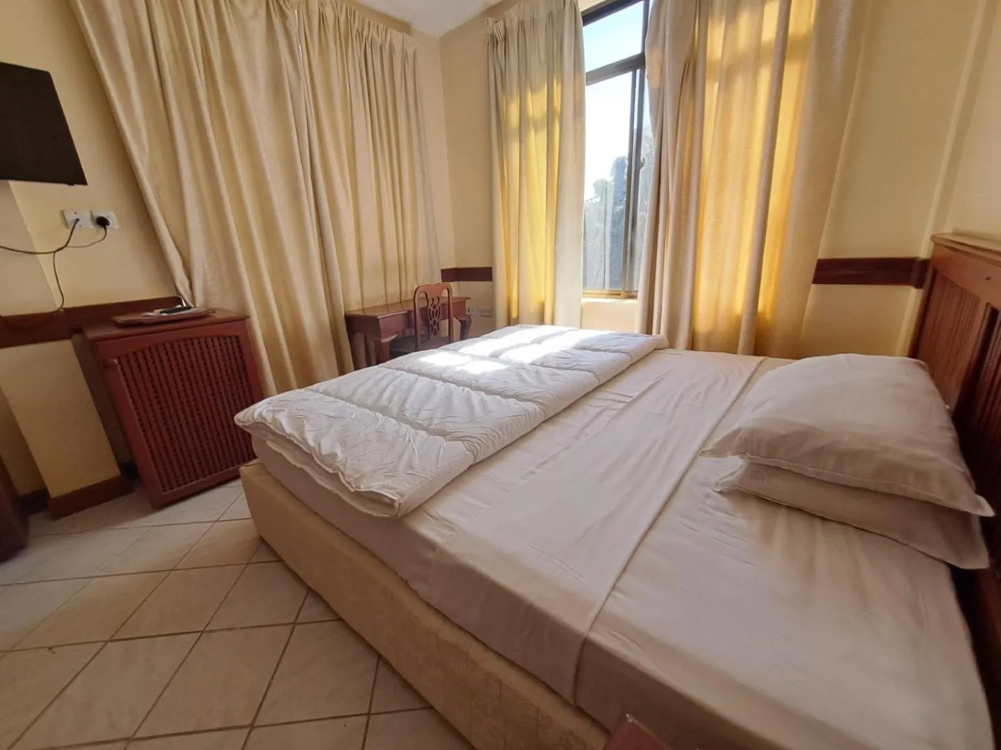 Bed in Moshi Leopard Hotel