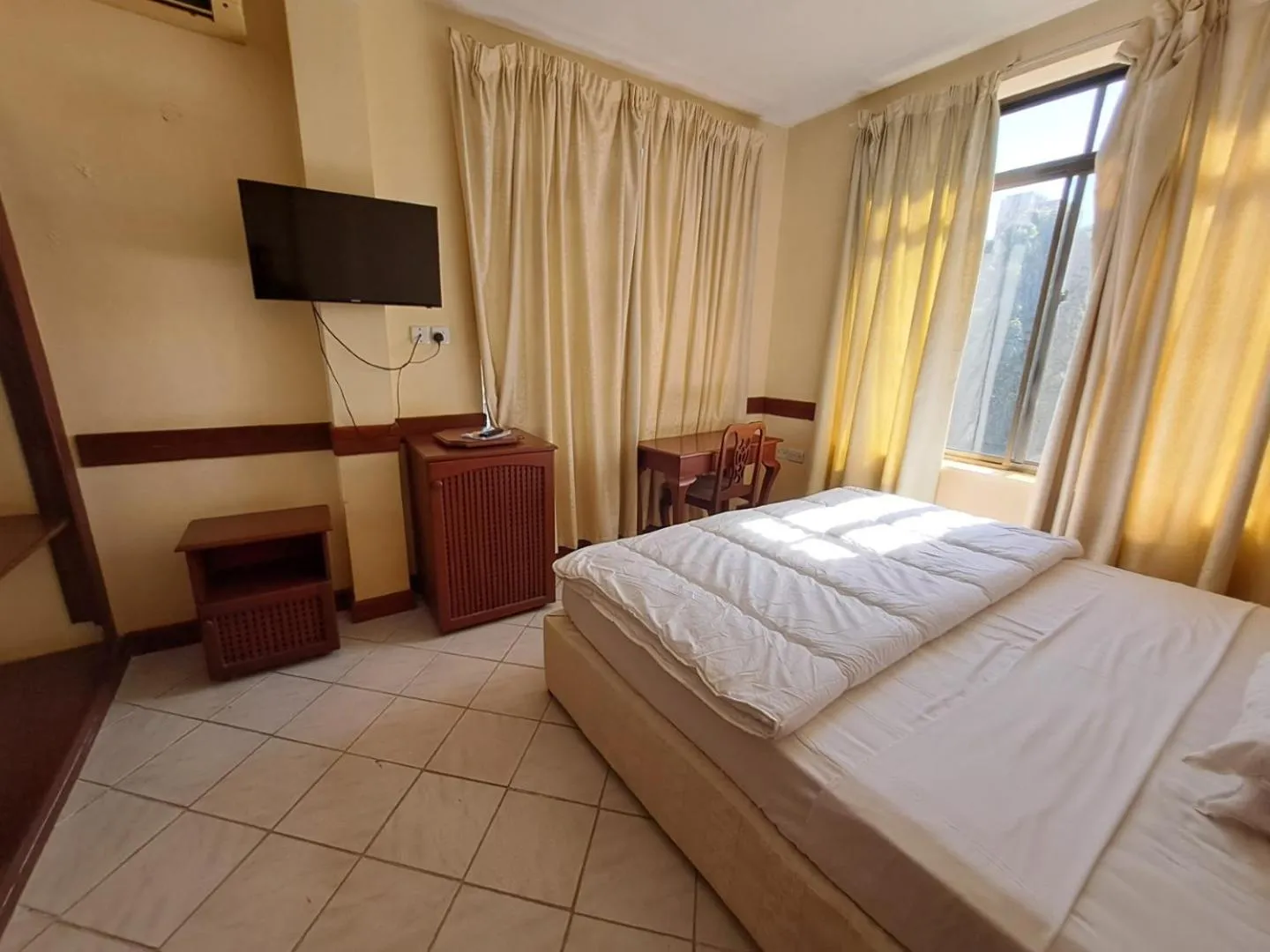 Bed in Moshi Leopard Hotel