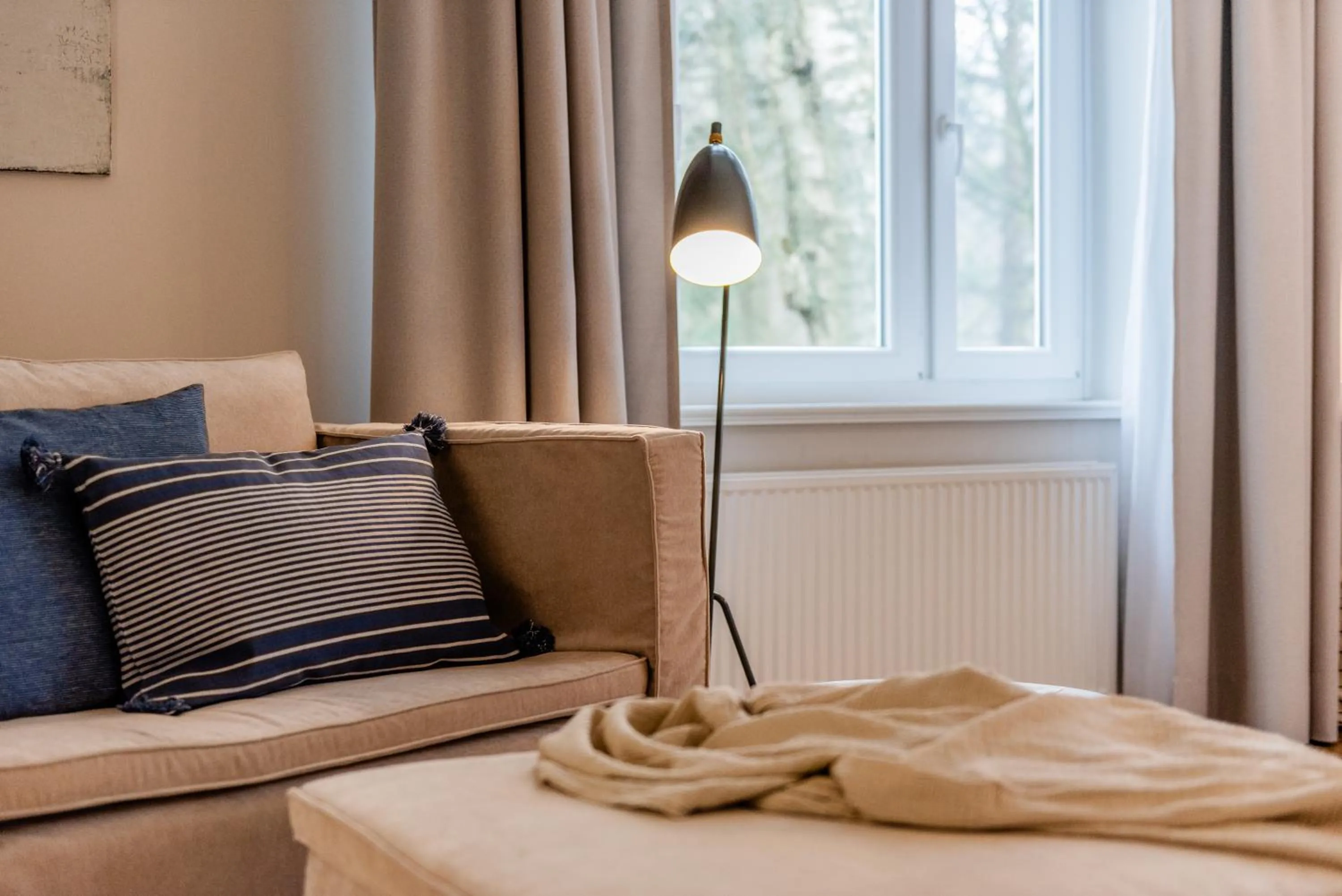 Seating area, Bed in Aarskogs Boutique Hotel