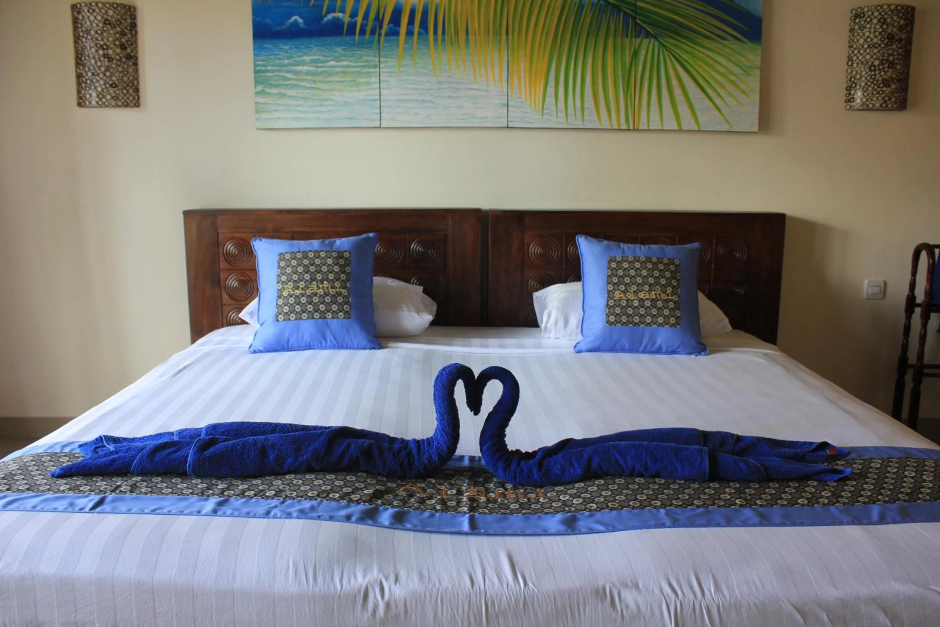 Bed in Alami Resort, Restaurant and Dive Center