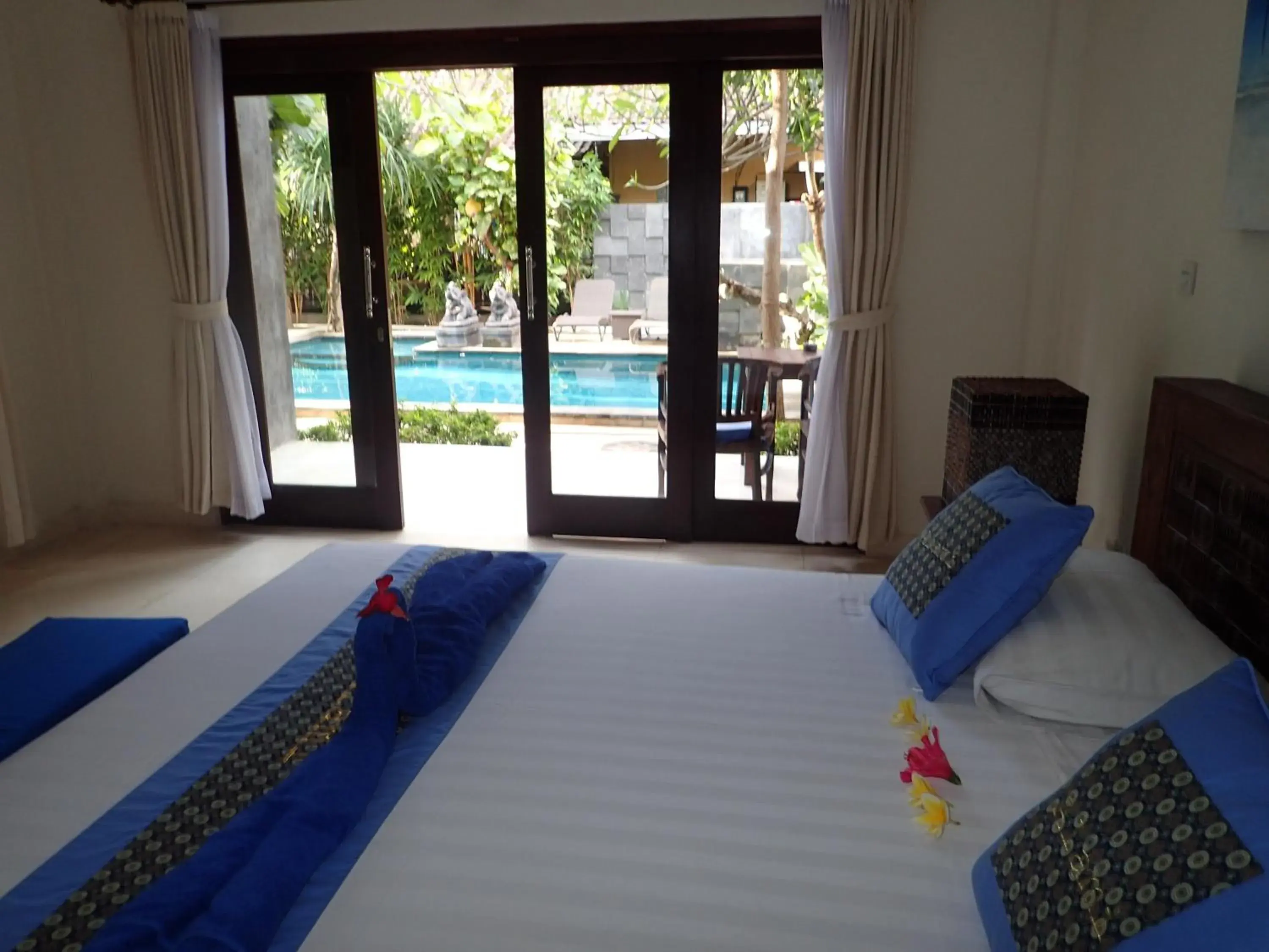 Bedroom, Bed in Alami Resort, Restaurant and Dive Center Bedroom, Bed in Alami Resort, Restaurant and Dive Center