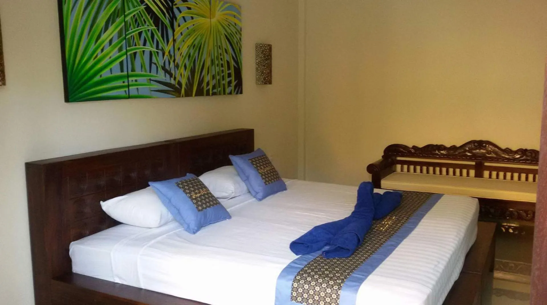 Bed in Alami Resort, Restaurant and Dive Center