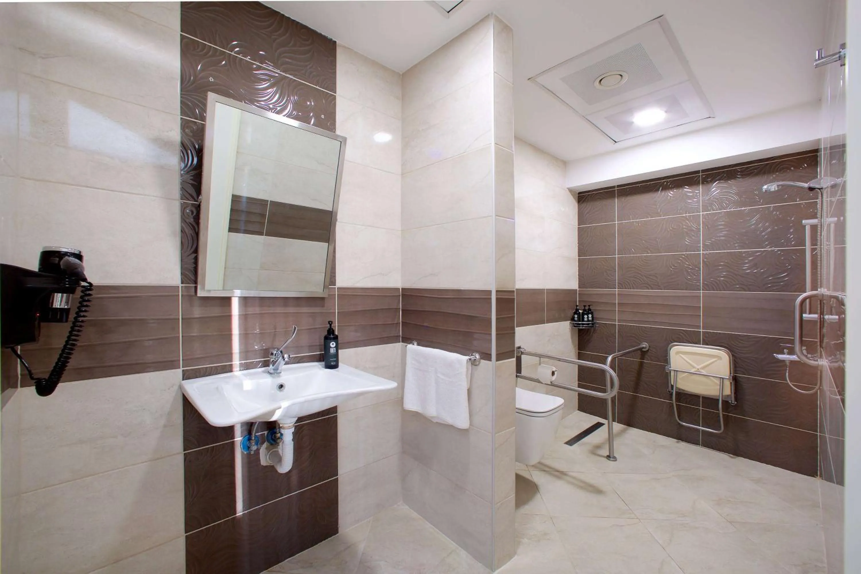 Shower in Ramada By Wyndham Soma