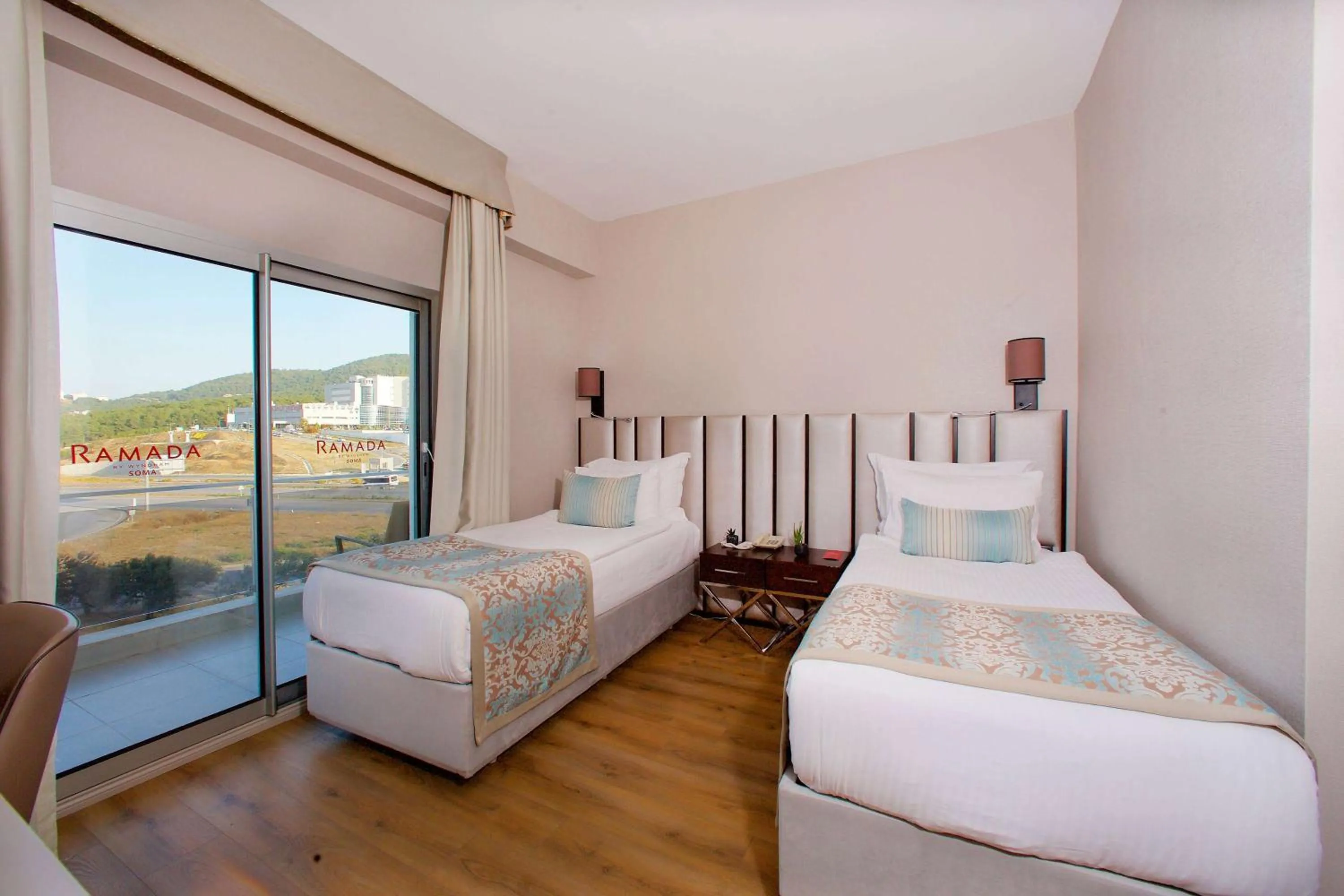 Photo of the whole room, Bed in Ramada By Wyndham Soma