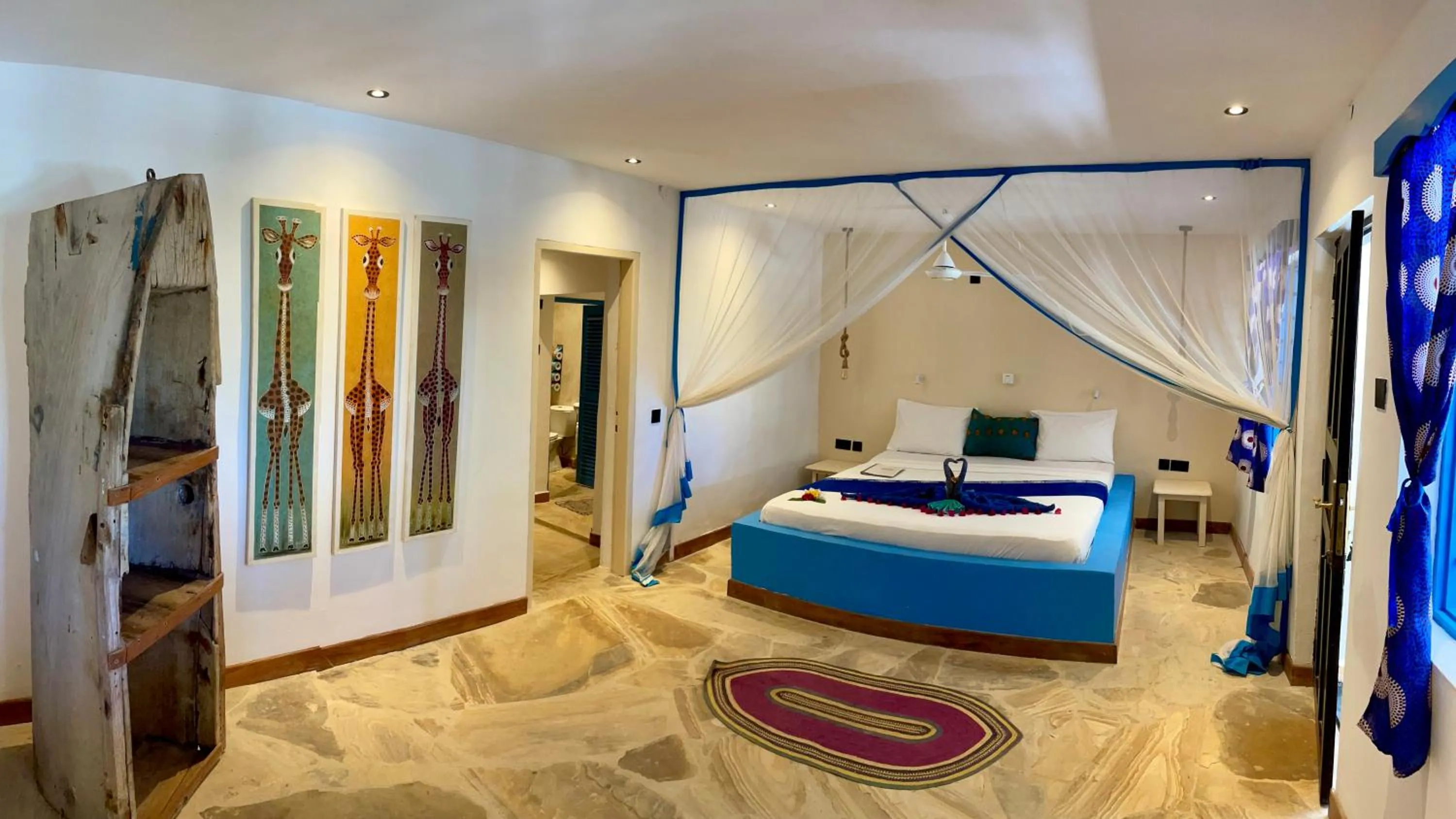 Bed in Blue Reef Sport & Fishing Lodge and Bungalows