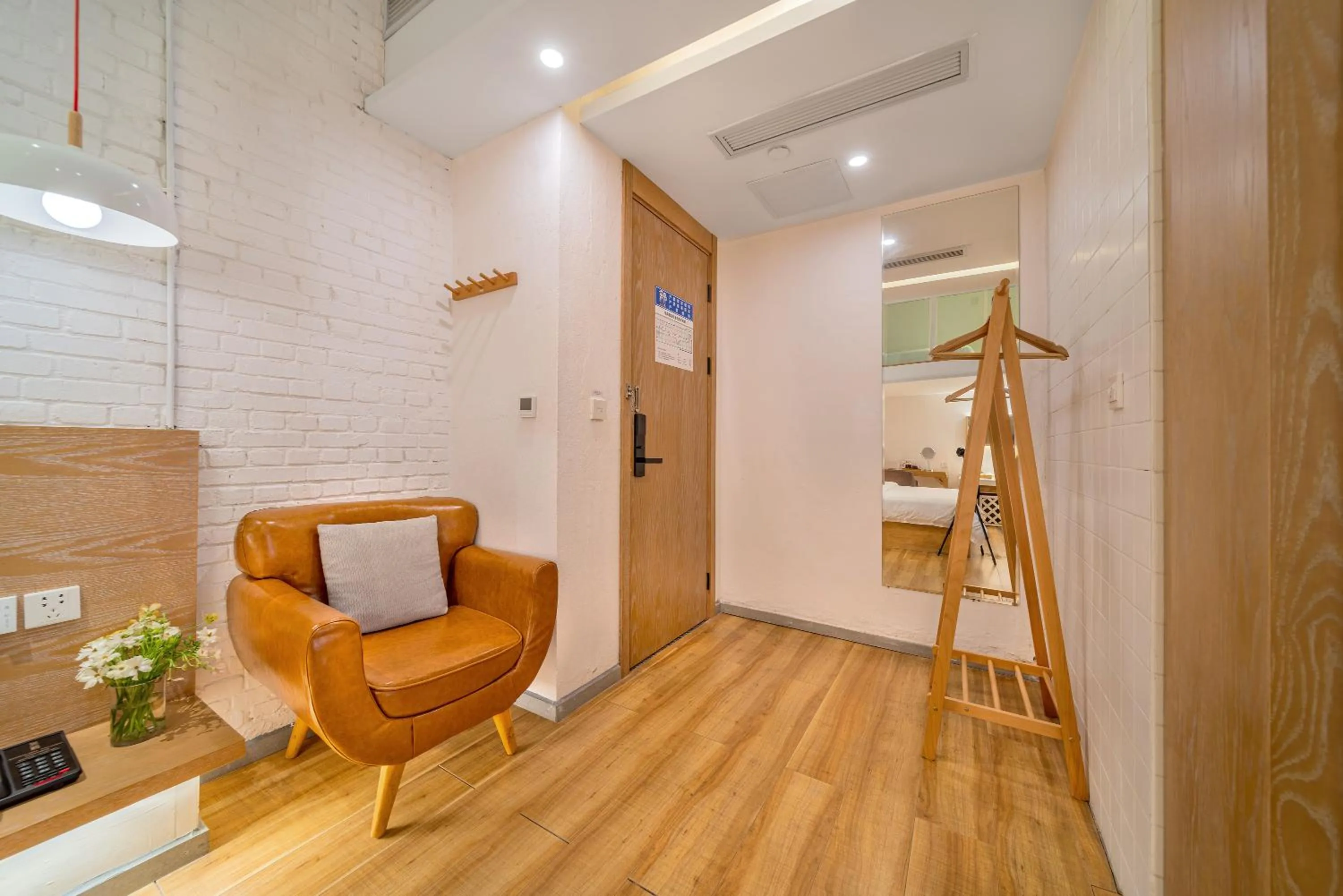 Living room in Wuyu Hotel Chongqing Southwest University & Jialing Riverside