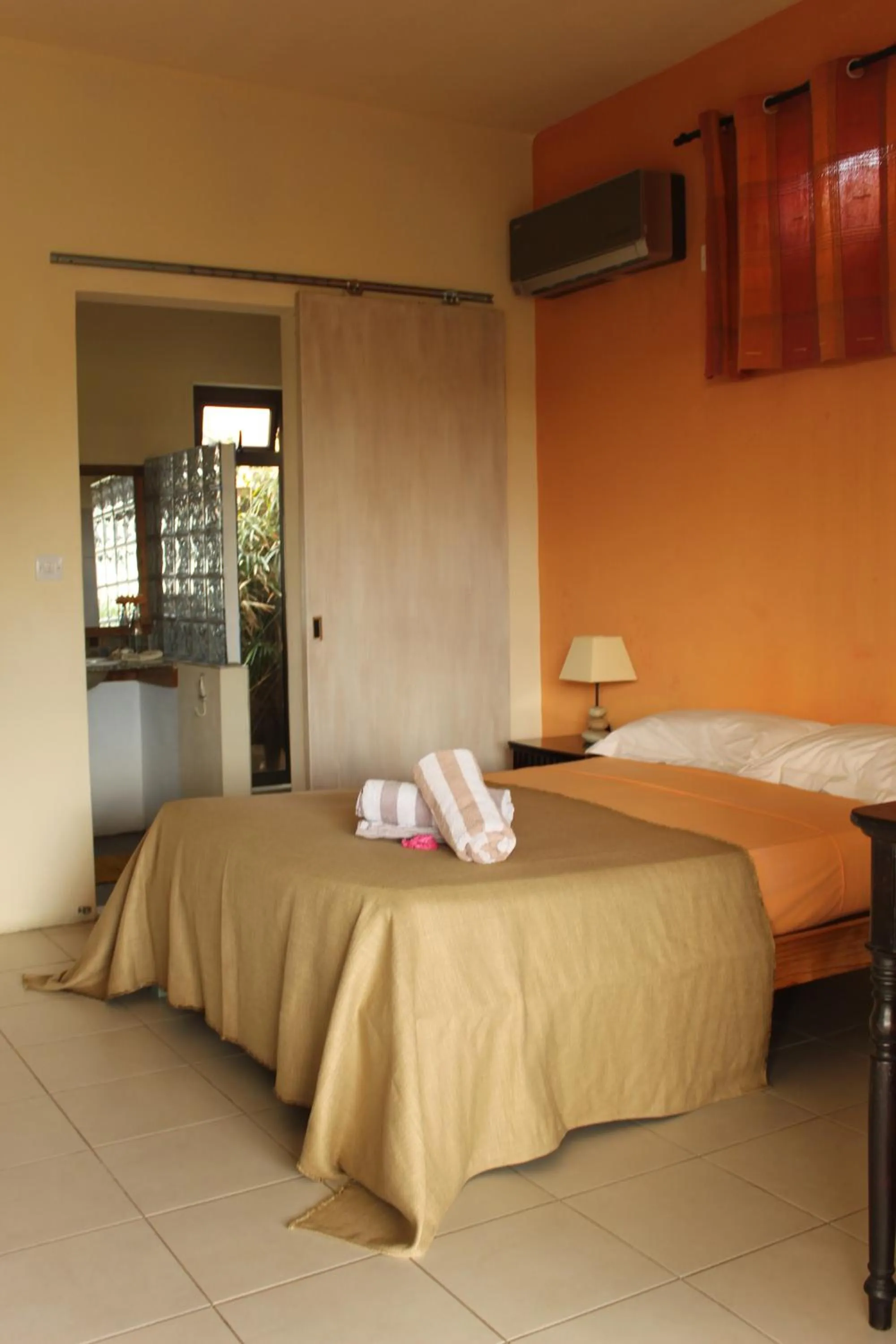 Bed in Gite des Acacias