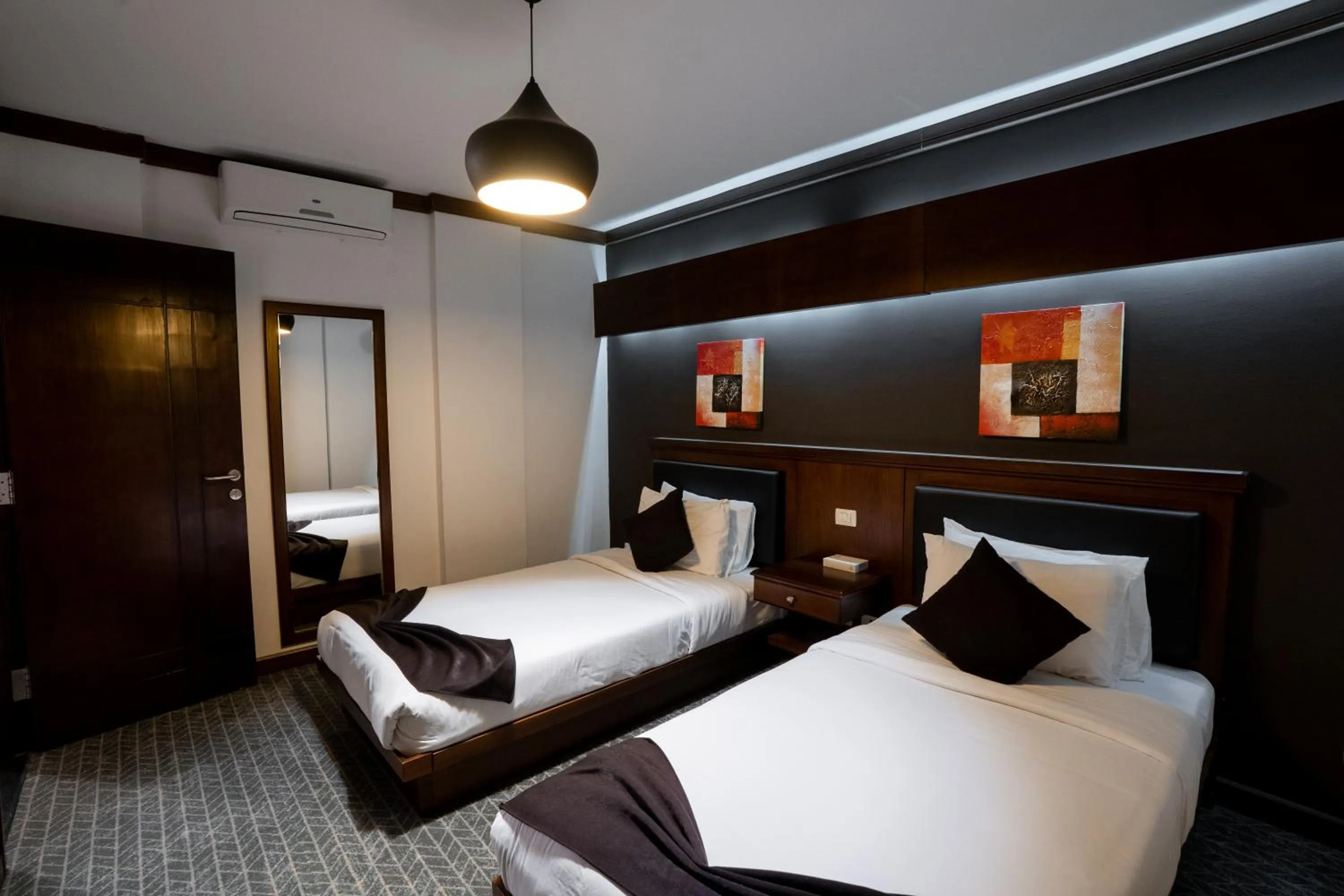 Bedroom, Bed in Panacea Suites Hotel