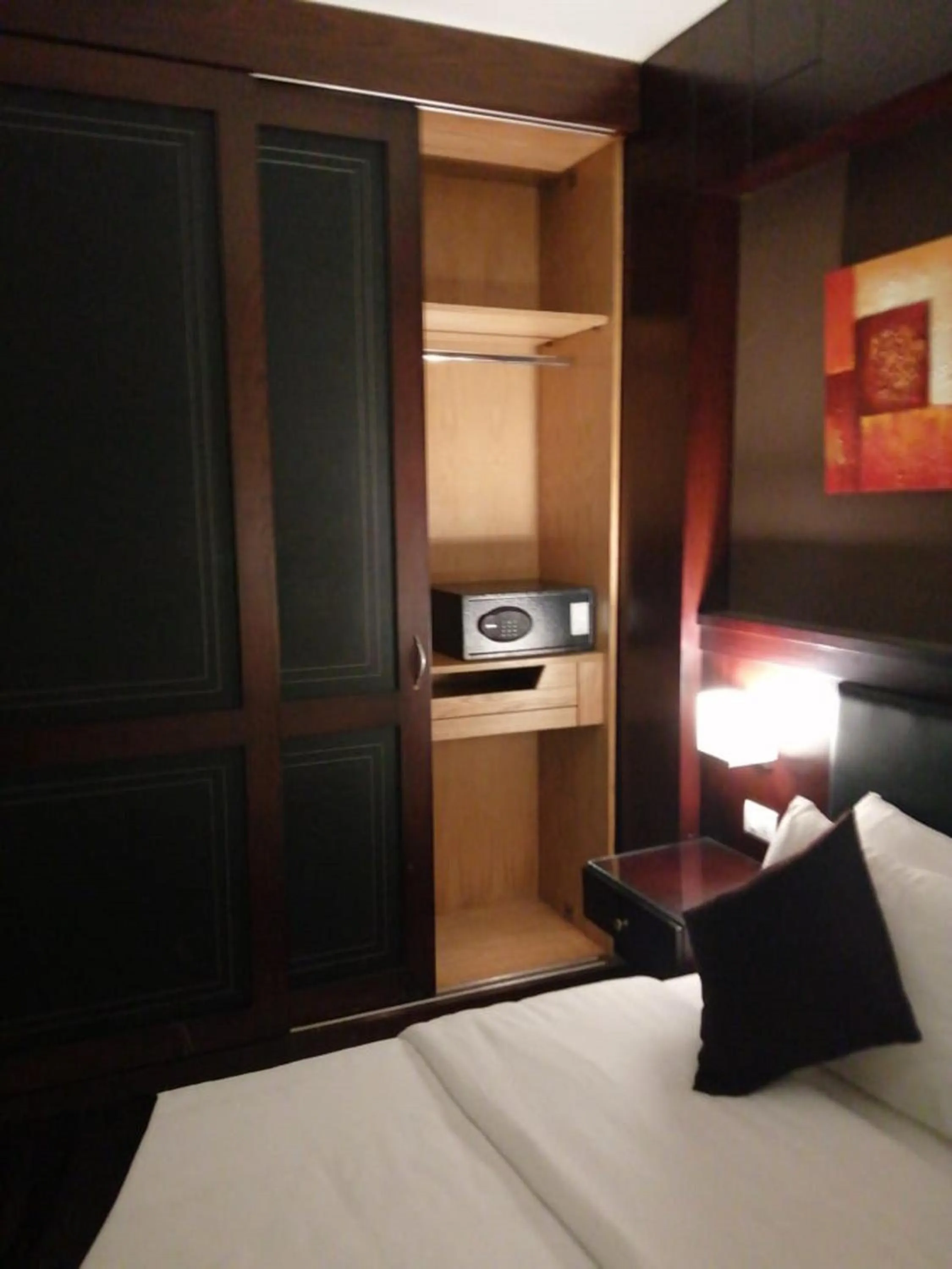 Bedroom, Bed in Panacea Suites Hotel