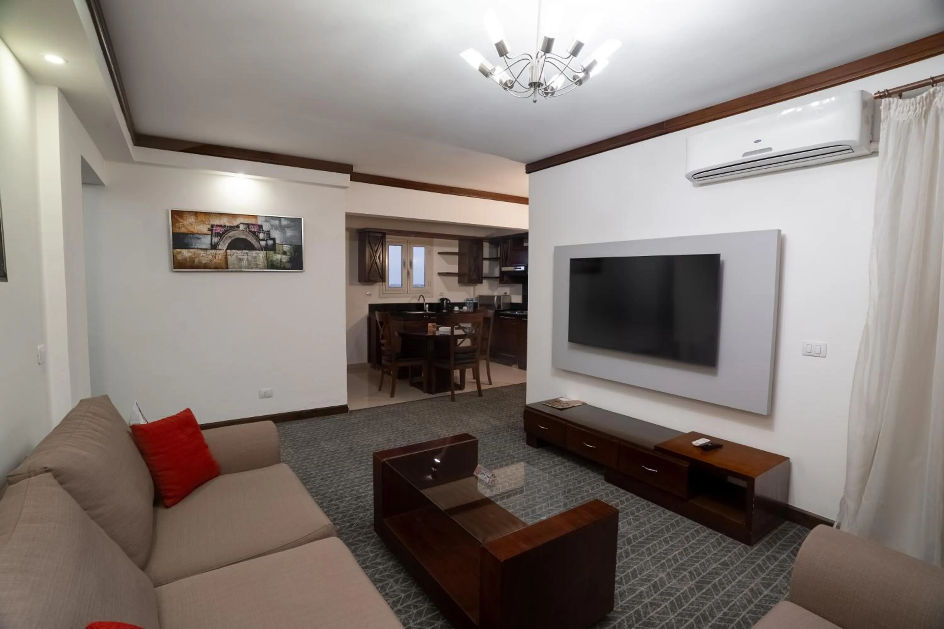 Communal lounge/ TV room in Panacea Suites Hotel