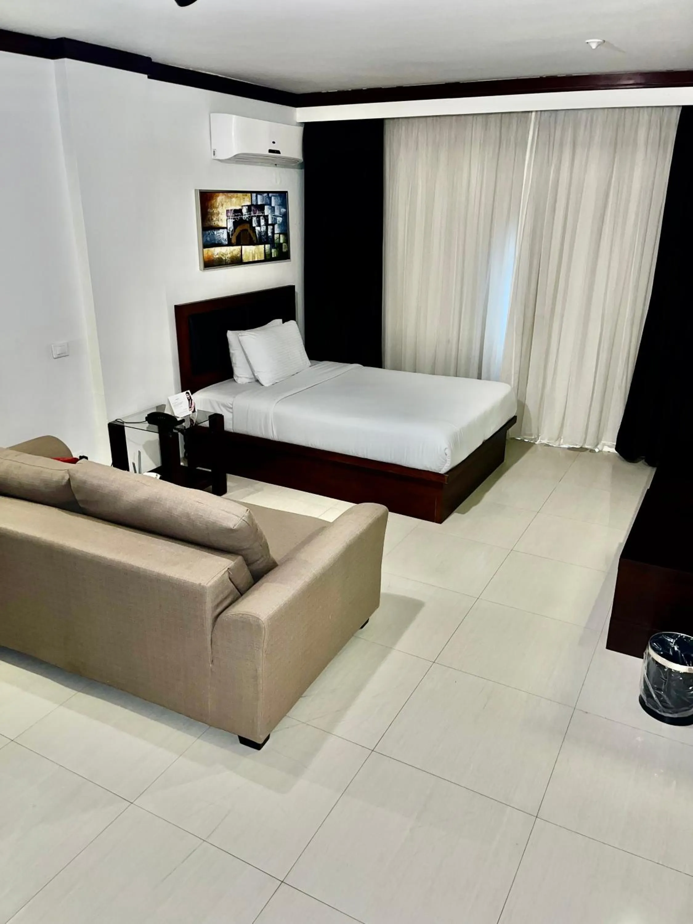 Bed in Panacea Suites Hotel