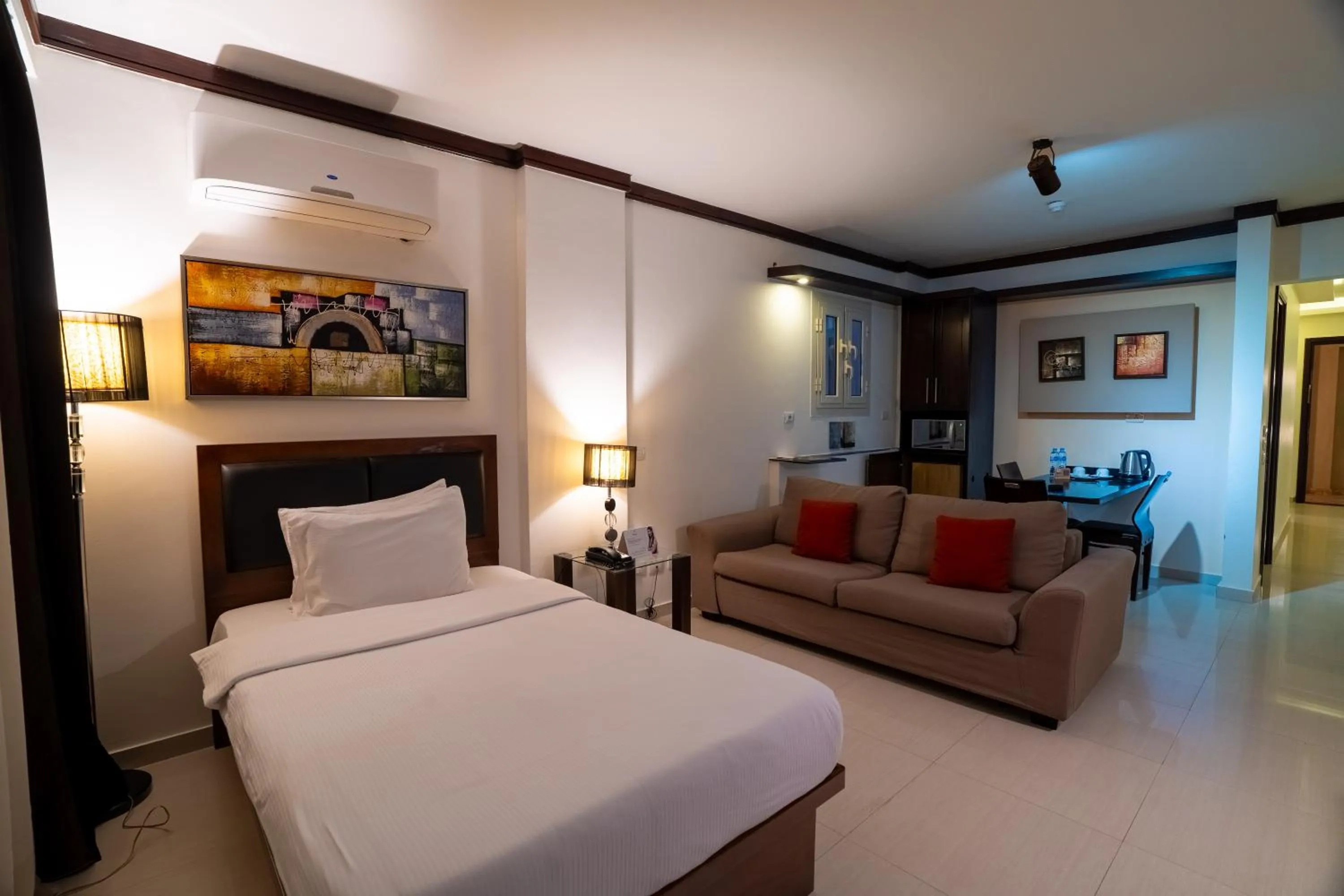 Bedroom, Bed in Panacea Suites Hotel