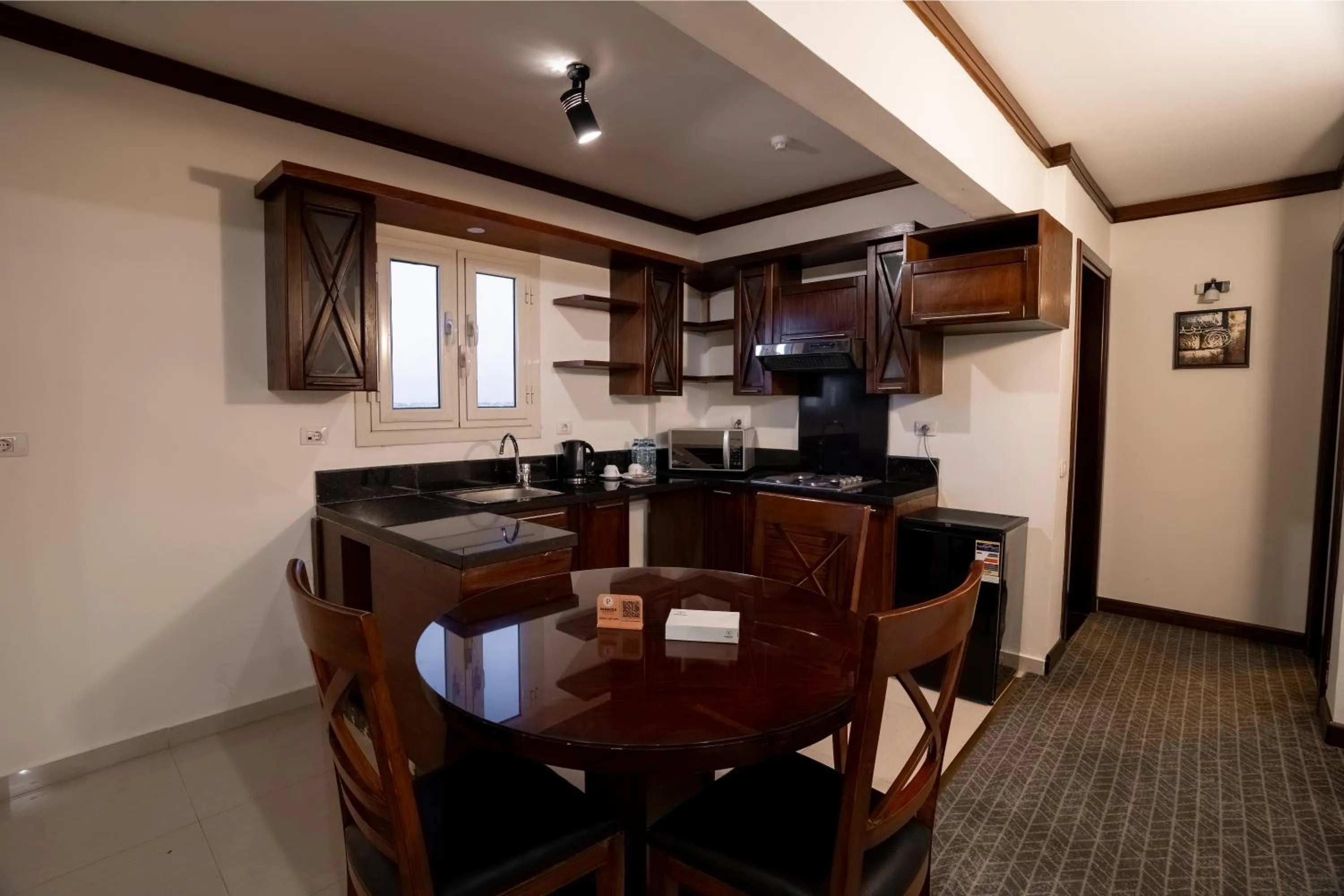 Kitchen or kitchenette in Panacea Suites Hotel