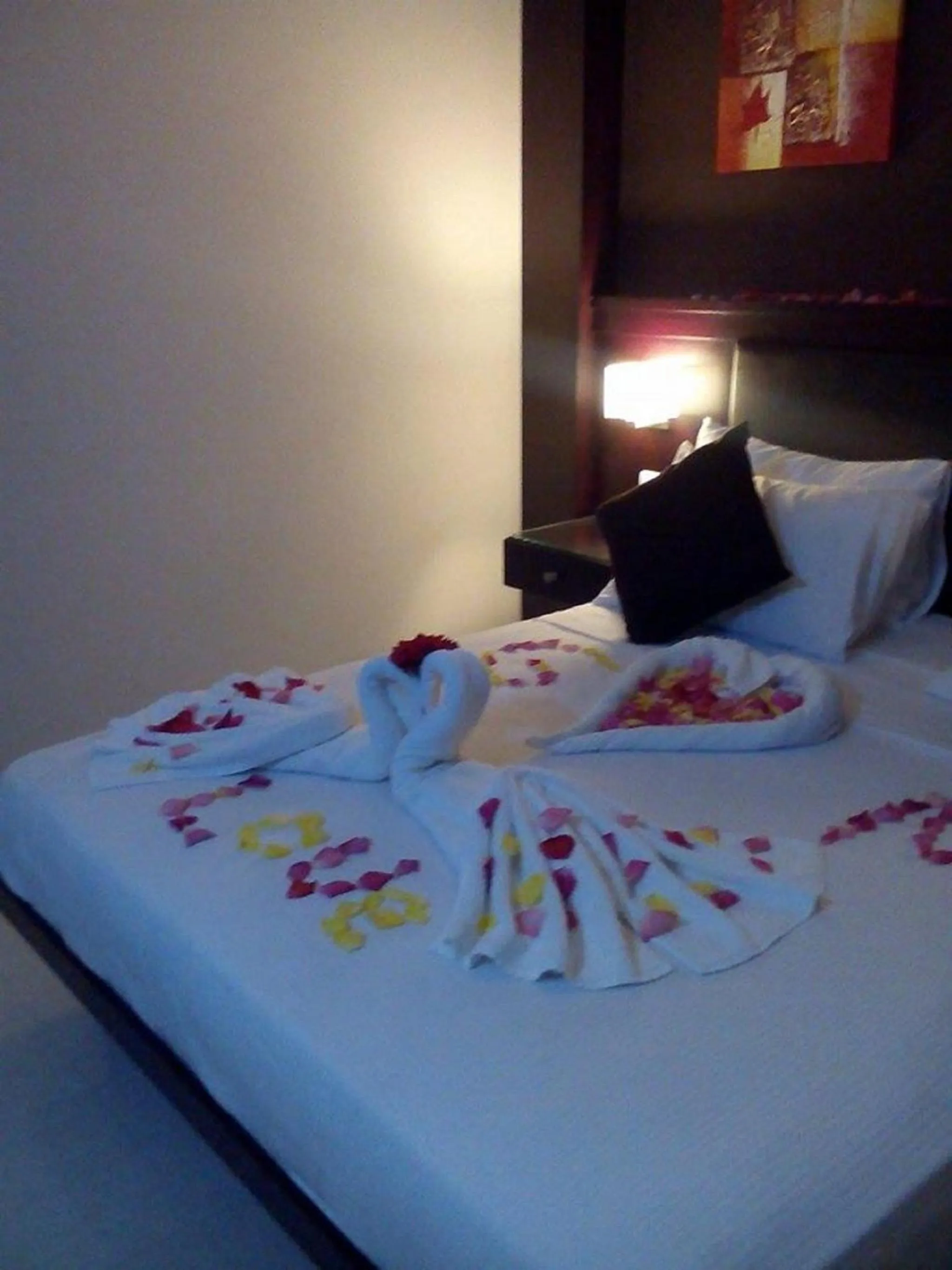 Bedroom, Bed in Panacea Suites Hotel