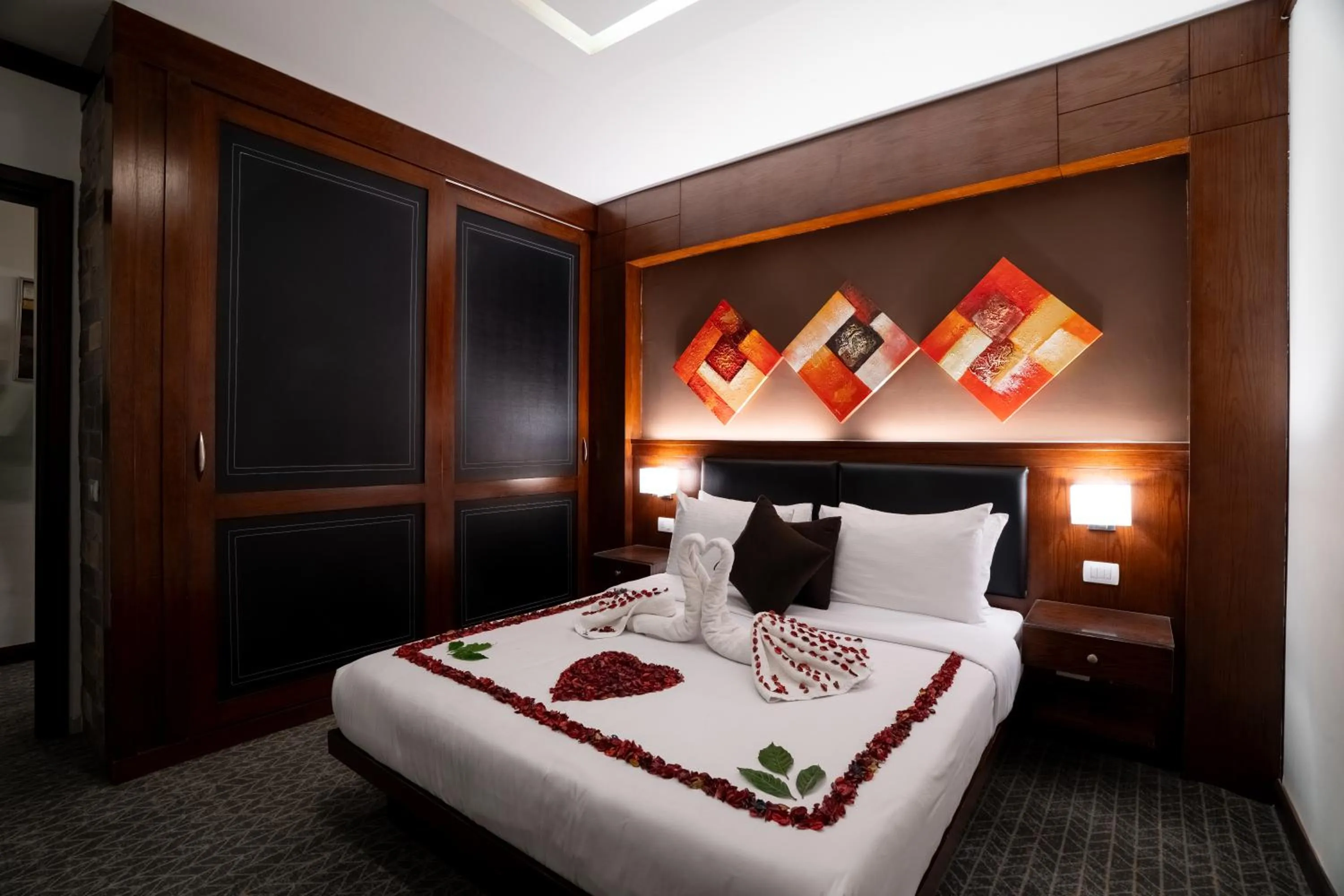 Bedroom, Bed in Panacea Suites Hotel