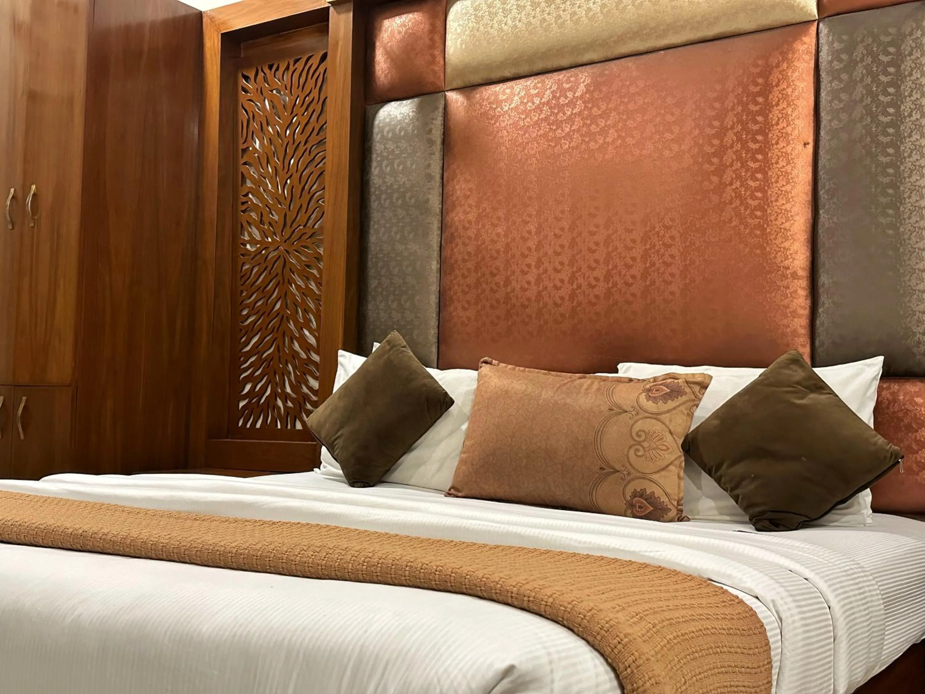 Bed in The Grand Hotel Multan