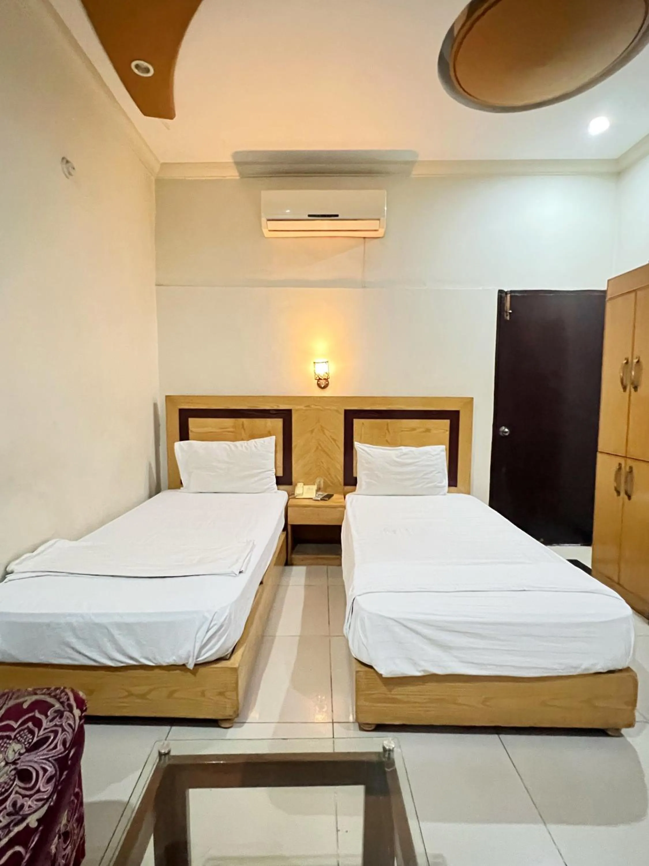 Bed in The Grand Hotel Multan